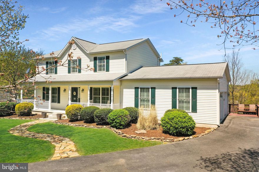 NICE COLONIAL HOME WITH 3 BEDROOMS AND 2 AND HALF BATHS LOCATED ON 1.3 +/- ACRE CORNER LOT IN WINDOVER HILLS SUBDIVISION. 2 CAR DETACHED GARAGE WITH STORAGE SPACE AND 1 CAR DETACHED GARAGE. NICE DECK OFF KITCHEN WITH BEAUTIFUL MOUNTAIN VIEWS AND LOWER LEVEL PATIO. BASEMENT COULD BE FINISHED TO ADD ADDITIONAL ROOMS. HOME WARRANTY INCLUDED