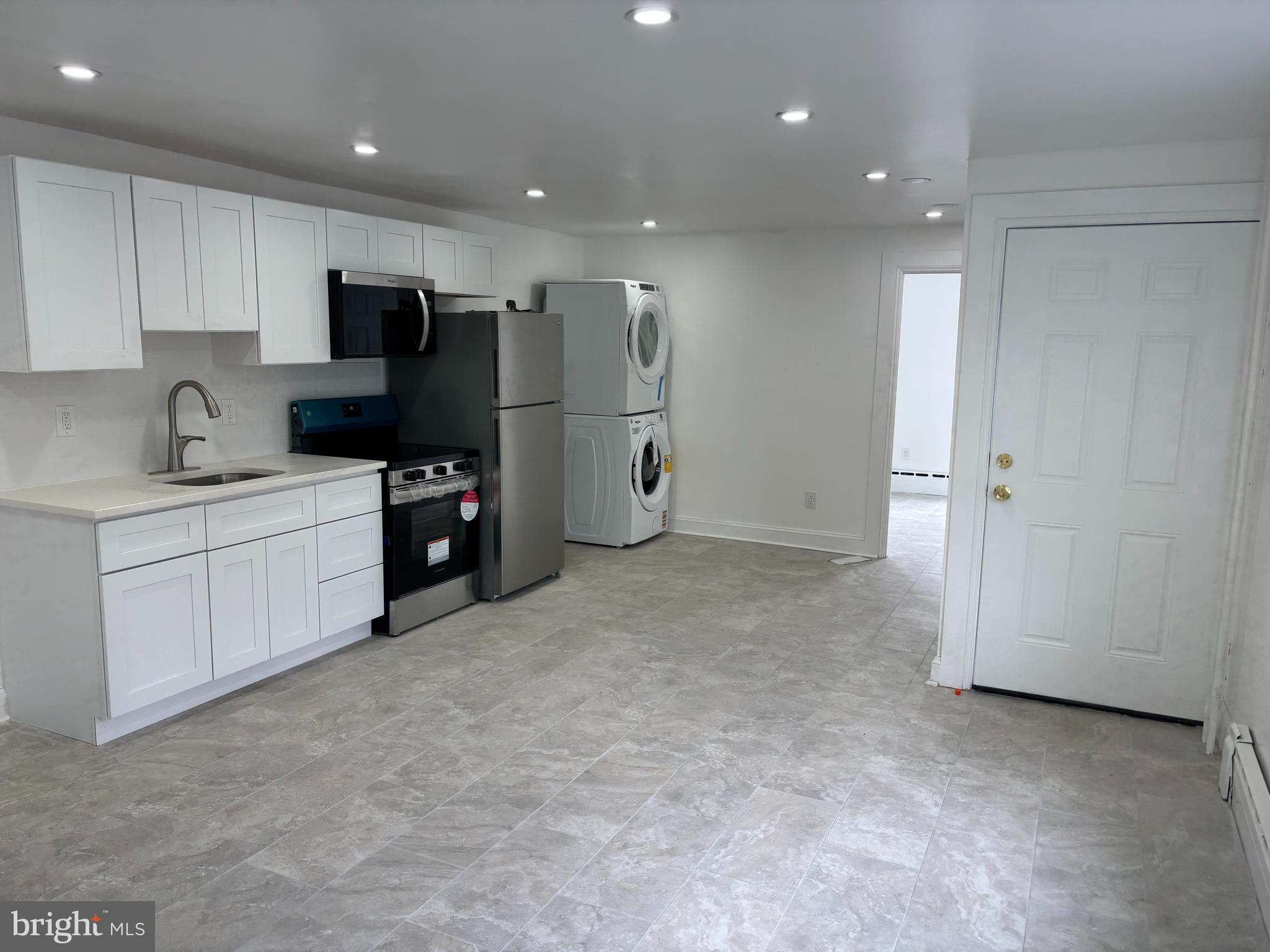 Recently renovated- Very large/1200SF- Great living area with hardwood flooring- Two spacious bedrooms-Ceramic tile bathroom- Kitchen has stainless steel appliances featuring refrigerator freezer and dishwasher. Laundry area with washer and dryer. All of this in the heart of a rejuvenated Bridesburg community.