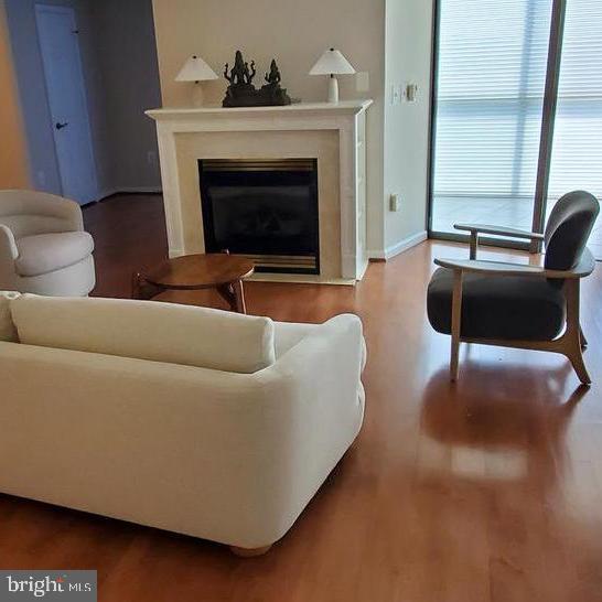 Beautiful apartment with stunning golf course views in Leisure World, a 55+ community that lives like a resort! Terrific open floor plan, including 2 BR's, 2 BA's, an office plus a huge sunroom! Laminate wood floors in the main living areas, and there's delightful fireplace with a mantel. The T/S kitchen offers lots of storage and counter space. There's an oversized garage handicap parking space, too! Leisure World offers so many amenities, including 2 clubhouses, 2 restaurants and a pub, fitness center, golf course, indoor and outdoor pools, MedStar Health Center, 24-hour security, and so much more! This home is an unbeatable value in today's market!