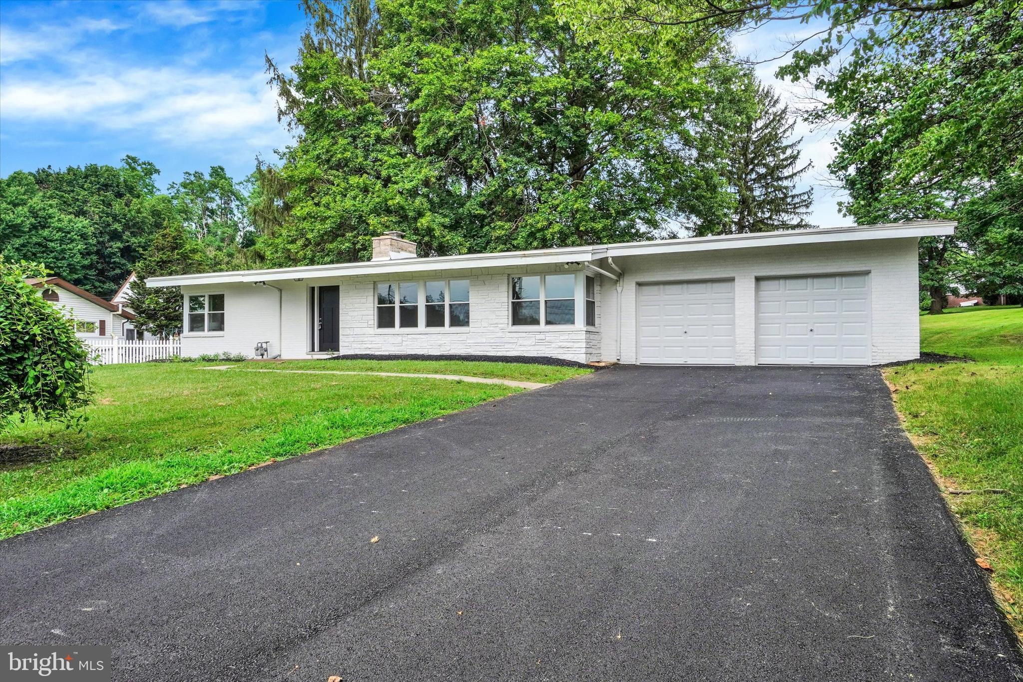 Stunning Updates to this Sprawling Rancher on almost 1 ACRE lot! New Designer Kitchen with Granite Countertops and Stainless Steel Appliances! New Paint and Flooring Throughout Entire Home, Updated Bathrooms with Tile Surround Showers and New Vanities! Updated Fixtures Throughout and New Energy Efficient Windows! Large Finished Room in Basement for Kids Playroom or Second Family Room! Large Heated Enclosed Porch in Rear of Home overlooking Large Rear Lawn! Come and See!