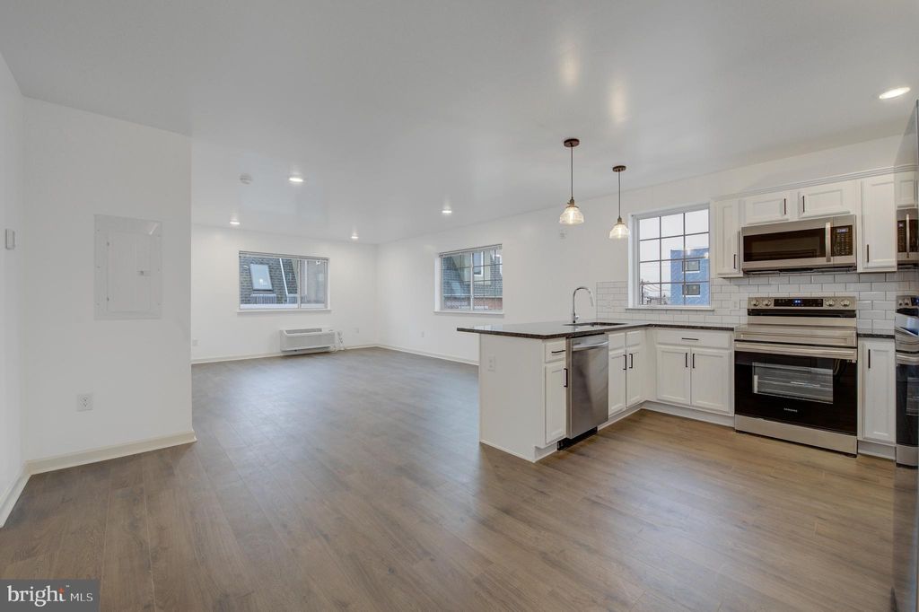 Photo of 6649 Ridge Avenue #C208, PHILADELPHIA, PA 19128 (MLS # PAPH2586420)