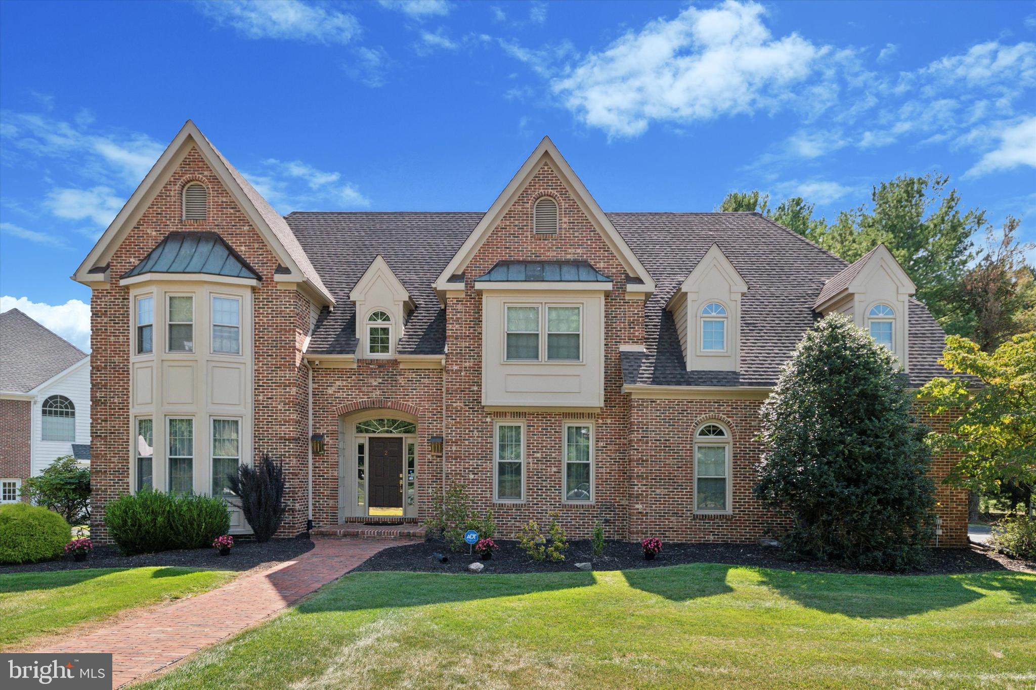 Welcome to 2 Stoney End Rd, on a cul-de-sac in Cedar Grove Farms, Broomall, PA – an impeccably maintained home that blends classic charm w/modern amenities. Nestled in a serene neighborhood, this stunning property offers an ideal setting for ease of living, relaxation & entertainment.
The grand 2-story foyer features a beautiful curved staircase, setting the tone for the elegance & architectural detail found throughout the home. First floor boasts hardwood floors & ceramic tile throughout. To the left of the foyer is the spacious & light-filled living room; currently used as a home office.
To the right of the foyer is the large & elegant dining room w/crystal chandelier as the focal point. Host a family gathering or an elegant dinner party with ease.
Step thru the DR & find the heart of the home; the gourmet kitchen is equipped w/top-of-the-line Wolf appliances, a built in steamer, pot filler, Wolf cooktop with a large grill in the middle and 4 gas burners. Double Wolf ovens w/warming drawer & built-in microwave drawer. A large pantry closet allows you to keep supplies close at hand. Whether you are a seasoned chef or enjoy cooking for loved ones, this kitchen is sure to provide endless opportunities to impress. There is a beautiful tumbled stone backsplash & complementing granite countertops. The kitchen windows overlook a fabulous Carlton Pool w/jacuzzi so you always know what's going on outside!
The open concept design seamlessly connects the kitchen to the informal dining area & the 2 story family room. The focal point is a gas fireplace that is flanked by beautiful windows allowing lots of light & views to the pool area. The door from the informal dining area allows you to step onto the deck that overlooks the backyard, pool and spa area; perfect for outdoor entertaining & simply joining the fun.
Clerestory windows along the 2nd floor of the family room provide natural light, privacy, and architectural detail.
The main floor also features a large 1st-floor bedroom & full bath, offering privacy, convenience & flexibility for guests, au pair or multi-generational living.
Upstairs, you will find a luxurious primary suite w/bay windows that provide extra space & 2 walk-in closets, a grand ensuite bathroom featuring a soaking tub & a separate shower w/skylight & 2 separate sinks! There are 3 additional generously sized bedrooms, 2 full bathrooms, a laundry rm, & a large open area perfect for a playroom or homework space completing the 2nd floor. Each bedroom has access to a bathroom.
For added convenience, a rear staircase next to the laundry rm provides easy access to/from the kitchen area & alternate entry from the large 2 car garage, driveway side door or storage garage-you can access the inside from the backyard for quick & convenient access to the powder rm from the pool area.
The lower level provides additional living/recreation space & storage. Currently the lower level houses a billiards area, a large bar w/its own frig, an aerobics studio, a holiday storage closet, a workshop with tool storage a “Costco” closet, & another powder room. Plenty of space for how you want to use it.
The pool area is a delight! Perfectly situated in the center of the yard, fenced in & landscaped for privacy. The patio area is perfect for summer barbecues. The pool heater was replaced in the 2024 season and the pool & it’s surround have been impeccably maintained.
Located in the highly sought-after Marple Newtown School District and just a short drive from shopping, dining, airport and major highways, 2 Stoney End Rd offers the perfect combination of convenience, fun, ease of living and tranquility.
There is a whole home generator. Water heater (2023). The roof was replaced in 2013 & serviced in 2024. The new high efficiency HVACs were installed in 2023 & include a UV air cleaner.
Don’t miss the opportunity to make this exceptional property your new home.