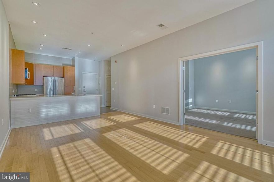 Discover Urban Sophistication at Twelve09 N Charles – Unit 309
Experience the pinnacle of Mount Vernon luxury living in this stunning 1-bedroom, 1-bathroom condo featuring an open floor plan, gleaming hardwood floors, and abundant natural light. The gourmet kitchen showcases stainless steel appliances and ample storage, while the spacious bedroom includes a generous walk-in closet and private en-suite bathroom.
As a resident of the prestigious Twelve09 N Charles building, you'll enjoy exclusive amenities including secure entry, your own assigned underground garage parking space, designated storage locker, on-site fitness center, and a beautifully landscaped courtyard oasis. This classically modern building seamlessly blends with Mount Vernon's historic architecture while offering contemporary conveniences.
Added Peace of Mind: The owner has graciously completed a comprehensive pre-inspection by a licensed home inspector, ensuring this property is move-in ready and meticulously maintained. This means you're renting a unit that meets the highest standards with complete transparency about its excellent condition.
Your location is unmatched – steps from Baltimore's renowned Penn Station (currently undergoing major renovations to enhance connectivity), University of Baltimore, world-class dining, theaters, and cultural attractions. At $2,000 per month with gas heating, water, and garbage included, plus the ongoing Penn Station Investment and Development Program elevating the neighborhood, this exceptional rental with garage parking represents extraordinary value in Mount Vernon's premium rental market.