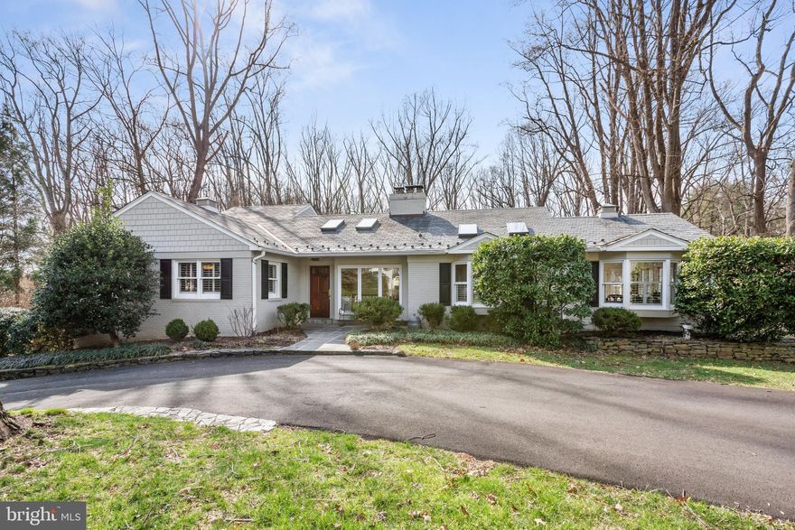 Discover a gem on Admirals Way: A Potomac One of a Kind! Introducing an architecturally unique home that embodies the pinnacle of meticulous design and unmatched location, perfectly aligned with its surroundings. Situated in a highly coveted community, this estate sprawls over an expansive 1.6+ acre lot, offering a harmonious blend of indoor and outdoor living spaces that epitomize comfort, character, and convenience. 
Welcome to 10828 Admirals Way, a Potomac jewel, where a 1958 Colonial marvel has been transformed into a contemporary sanctuary. Spanning over 3,800 square feet, this home features 4 bedrooms, 3 full bathrooms, and a powder room, complemented by parking accommodations for two, and the tranquility of nature right to your doorstep. Enjoy the rich, wooden floors and let the cathedral ceilings of the living room, complete with a wood-burning fireplace and built-in shelving, envelop you in warmth and sophistication.
The heart of this home is undoubtedly the gourmet kitchen, a chef's dream with restaurant-grade gas appliances, cutting-edge ovens, and refrigerators. Skylights and expansive windows flood the space with natural light, leading to an adjoining family room and outdoor decks that promise endless entertaining possibilities.
The home's thoughtful layout includes a luxurious primary suite featuring a modern bath with dual vanities and private deck access. A second bedroom and full bath are also located on the main level. The lower level offers two additional bedrooms, a hallway bath, and a family room that opens to a covered porch, perfect for gatherings.
Beyond the fenced backyard, the property merges seamlessly with parkland, offering privacy and a gateway to outdoor adventures. 5-minutes away is Swains Lock House and Canal access. This Admirals Way treasure is not just a home; it's a lifestyle waiting to be embraced.