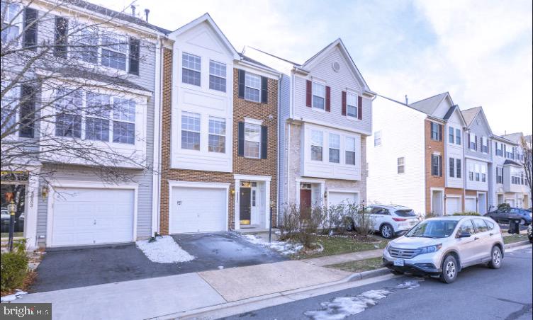 This three level townhouse located in heart of Sterling Virginia promises both convenience and comfort for its tenants. Placed close to route 7 and within minutes of major shopping malls and Dulles town center it provides all the amenities of suburban living. With 3 bedrooms, 3.5 bathrooms, and over 2030 sq feet of living space and high ceilings, your space will not be wanting. The main level has a light-filled kitchen, living area, and dining room with refinished laminated floors, SS appliances, granite countertops, and a walk-out deck. The master bed room is spacious, with a walk-in closet, excellent lighting, and ceiling fan. All other bedrooms are well-designed and have plenty of closet space. The ground level is provided with washer/dryer, an in-law suite with a full bathroom opening to a private backyard beyond which is a secluded green zone. A one-car private garage and parking space are supplemented with plenty of additional parking nearby.