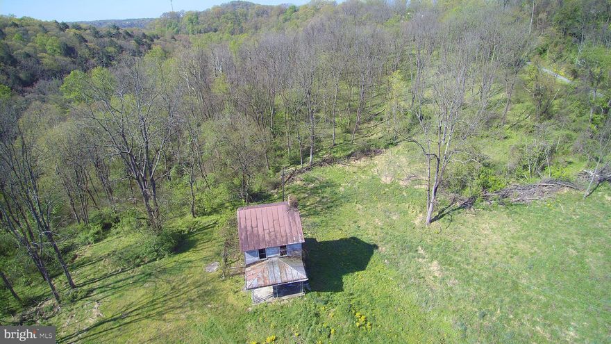 Rare opportunity to find 189 acres all adjoining, 124 acres wooded with Cocolamus creek- well stocked Trout Stream- flowing through a portion of the eastern end of the property, in Greenwood Township, Perry County.  Timbered in the 1960's, facing the northern side, you will be sure to find enough timber to build your own log home. While 64.7 acres is in the Millerstown Boro mostly pasture great for organic farming and has never been sprayed, public sewer and public water close by but unknown of capacity. Land is in clean and green since late 1990's. Old farmhouse on the open field portion with a well and septic on site but statis is unknown and hasn't been lived in for over 40 years. Great for a future development or build your dream home far away from the rest of the planet, enough room to even have your own runway for your own jet. Oh what money can buy? No drive Bys so call your favorite agent and pack up your gator today for a private tour.