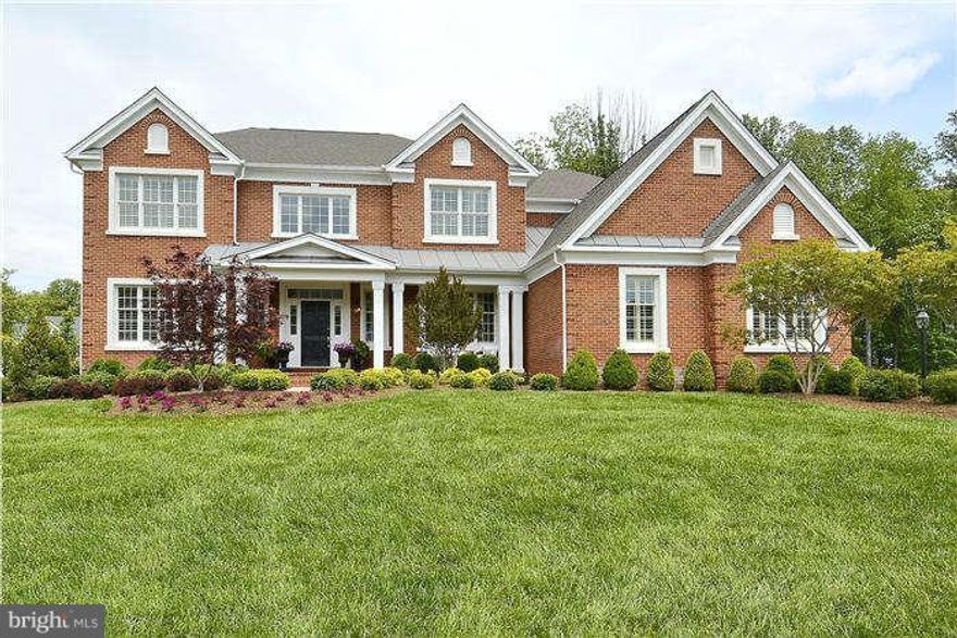 Spectacular Toll Bros.Harding w dual staircase, open foyer, hardwoods,kitchen w granite & top of the line cabinets, SS appls,opening to huge Naples sunroom, library w cherry built-ins, 2 story stone fpl in family room, walkout to screened porch w fpl. 2000 sq foot stone patio w outdoor kitchen, bar, waterfall & Viking appliances. Plantation shutters throughout, back staircase & irrigation system