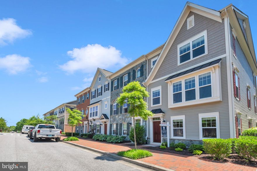 Excellent rental opportunity in Village Greens of Annapolis. This spacious three-level townhouse has been meticulously maintained and is ready for a renter. Upon entry, you will be greeted by hardwood floors and neutral paint colors throughout. The lower level has a large living area, powder room, and access to the two-car garage. Upstairs you will find spacious and comfortable main-level living with a second living room. The kitchen is perfect for any chef, you will enjoy an open concept which is great for entertaining. The kitchen is complete with granite countertops, stainless steel appliances, gas cooking, an island with bar seating, plenty of cabinetry, and a pantry. There is room for a large dining table and a breakfast nook. The dining area also has a cozy, double-sided gas fireplace! Off of the main level is an outdoor deck, perfect for morning coffee or watching a sunset while enjoying the double-sided fireplace. You will find all three bedrooms on the third level of the townhouse and two full bathrooms. All bedrooms have vaulted ceilings and plenty of windows for ample natural lighting. The primary bedroom has a walk-in closet and a bathroom with a dual vanity. The back portion of the neighborhood to access the garage and driveway is gated which makes for added privacy. This townhouse has a two-car garage with electric vehicle charging capability and a spacious driveway. There is also extra, on-street parking in the front of the home. Village Greens is about a five-minute walk to restaurants like Ledo Pizza, and Shika Sushi. You will also be close to convenience stores, shopping, and recreation like Quiet Waters Park! Downtown Annapolis and the United States Naval Academy are a short drive away. Commuters will enjoy quick access to interstate routes, Washington DC, Baltimore, and BWI! Make your appointment to see this one today. Pets are case by case, 680+ credit score required.