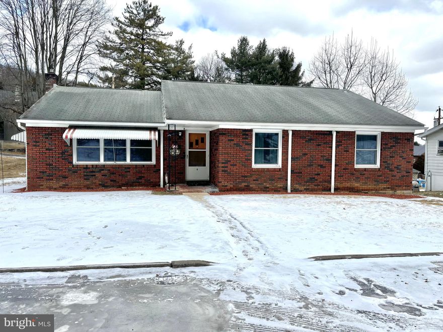 This cozy 4-bedroom, 1-bathroom brick ranch home offers 1,471 square feet of living space on a .21-acre lot, located on a quiet street. The home features hardwood flooring throughout and spacious bedrooms with large closets for ample storage.

The kitchen is fully functional and has been well-maintained. While the sellers had plans to update it, it remains in good condition and ready for use, giving the new owner the opportunity to personalize it if they wish. The home comes with newer appliances, including a dishwasher and fridge (2022), and a new stove and microwave in the basement, ready to be installed.

Five mini-split units were added to keep the home comfortable, along with a new hot water heater in 2023. Off the kitchen is a sunroom with a large serving window, providing additional space that is currently used as an office but could easily serve other purposes. It is part of the home’s temperature-controlled space and includes a back entrance.

The full unfinished basement provides plenty of storage, and the one-bay garage offers extra space for a vehicle or projects. The driveway allows for off-street parking and leads to the garage.

Outside, a new gazebo is anchored to a patio in the backyard, offering a relaxing outdoor space. This home provides a great opportunity for comfortable living in a peaceful setting, with easy access to local amenities. With its spacious layout and potential, this home is ready to provide a welcoming environment for its new owners.