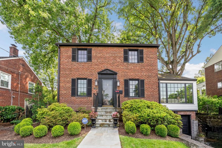 Nestled in the serene Timber Branch Park, this brick Colonial-style residence, built in 1939, seamlessly blends timeless charm with modern comforts. As you step inside, the warm ambiance welcomes you, highlighted by rich hardwood flooring and elegant crown moldings that grace the living spaces. The traditional floor plan invites you to explore a thoughtfully designed layout, featuring a formal dining room perfect for hosting gatherings and a cozy family room that flows effortlessly from the kitchen. A gas fireplace with a charming mantel adds warmth and character to the living area, making it the perfect spot to unwind. The heart of the home is the galley kitchen, equipped with upgraded countertops and a suite of high-end SS viking appliances, including a self-cleaning gas oven, built-in microwave, and a refrigerator with ice maker. Whether you're preparing a casual meal or entertaining guests, this kitchen is both functional and stylish. Three bedrooms on the upper level with a beautiful updated bathroom featuring a soaking tub and heated floors providing a spa-like experience right at home. Additional bedrooms offer ample space for guests or a home office, ensuring versatility for your lifestyle needs. Venture downstairs to discover a fully finished basement, complete with garage access and additional storage, providing endless possibilities for recreation or relaxation.  A second updated full bath w shower is located on lower level off of the family room. Step outside to your private oasis, where extensive hardscaping and beautifully landscaped grounds create a serene environment. Enjoy the soothing sounds of the water feature amidst the backdrop of trees and open common areas, offering a sense of seclusion and tranquility. The patio is ideal for al fresco dining or simply enjoying a morning coffee while taking in the panoramic views of the wooded surroundings. The yard is tiered with additional seating areas on the lower level secluded by lush plantings. Parking is a breeze with an attached garage and a concrete driveway, ensuring convenience for you and your guests. This home is not just a residence; it's a lifestyle, offering a perfect blend of comfort, elegance, and nature. With its prime location just minutes from major transportation routes, this property provides easy access to the vibrant offerings of the surrounding area while maintaining a peaceful retreat. Enjoy the convenience of Shirlington, Del Ray and Old Town while surrounding yourself with peaceful tranquility. Welcome home!
Upgrades: Fireplace converted to gas, hearth & surround 2017, scraped wood floors LL- 2017,Kitchen update 2017, flagstone patios LL-2018, UL bathroom renovation -2019, Outside fixtures converted to gas -2021, New HVAC -2021, Irrigation-2021,New windows-2020,
Replaced gutters -2020,Study renovation - 2020, washer/dryer -2024.