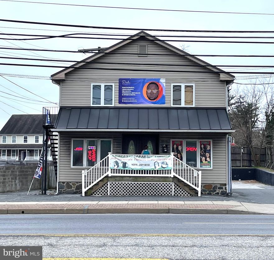 Don't miss out on this prime commercial location on high-traffic Liberty Rd with exposure to 50,000+ cars per day. Great visibility and highly accessible from  695. Currently this 1338+/- sqft building is leased. 1st floor for barbers and braiders and 2nd Flr for Photography services. This building is turn-key; you can keep everything as-is and rent the entire building OR you can move your business in.  This building features a paved parking in the rear for up to 8 vehicles.  This property is zoned BL and could be used for Retail Sales, Personal Services, Restaurant, Bank, Office, Food Store, and Medical Clinic. Property is being sold "AS-IS". Barber Chairs and Stations are included in the sale. There is so much potential for this property and such a great location for a business. Hurry before it's gone.