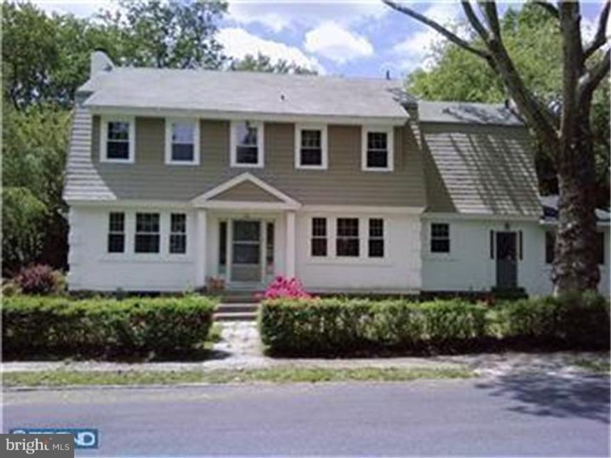 Great Merion Station Center Hall Colonial, 4-6 bedrooms. Beutiful floors through out. Large Living Room with fire place, big dining Room, tiled powder room, newer eat in kitchen with tiled floor, glass sliders to Deck overlooking back yard with a stream. 2nd Floor: Master Bed Room, Master bath with jacuzzi tub and shower additional room office/den/bed room, three additional large corner bedrooms and hall Bath. Finished basement. First floor also contains a complete one bedroom apartment or in-law suite with a separate enterance. This property is 2 blocks to Merion train station, short walking distance to Merion Elementary School, Bala Cynwyd Library and Narberth shops.