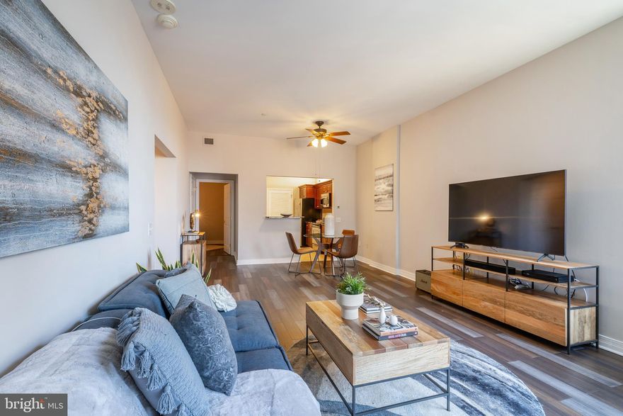 VIEWS VIEWS VIEWS! Here is your opportunity to live in a rarely offered and most sought after floor plan at the Phoenix Condominium. Nestled on the 12th floor, this gorgeous unit features 2 bedrooms and 2 bathrooms with beautiful views! Enter the condo and you will immediately notice the new hardwood floors, high ceilings, and open floor plan offering enough room for both a large dining table and a living area. The modern kitchen features beautiful granite countertops, GE stainless steel appliances, and a large pantry.  Adjacent to the kitchen you will find a separate closet with a full-sized washer and dryer.  Completing the living space is a large hall coat closet and a full bathroom with a custom frameless glass shower, granite vanity, and tiled floors. Adjacent to the bathroom is the second bedroom/den with a spacious closet.  On the opposite side of the condo is the primary bedroom with views of the Parkway, a walk-in closet, and an en-suite bathroom with a tiled tub/shower combo. The condo also features a brand-new HVAC system. Perfectly situated in the Logan Square neighborhood, The Phoenix is a pet friendly building with 24/7 concierge, valet parking (additional fees apply), beautifully landscaped rooftop terrace with outdoor grills, and breathtaking 360 degree views of the city. Residents have access to a fitness center/weight room, media room, and direct access from the residence elevator to Suburban Station. Close to all major highways such as I-76 and I-95 and city nightlife. Welcome Home!
