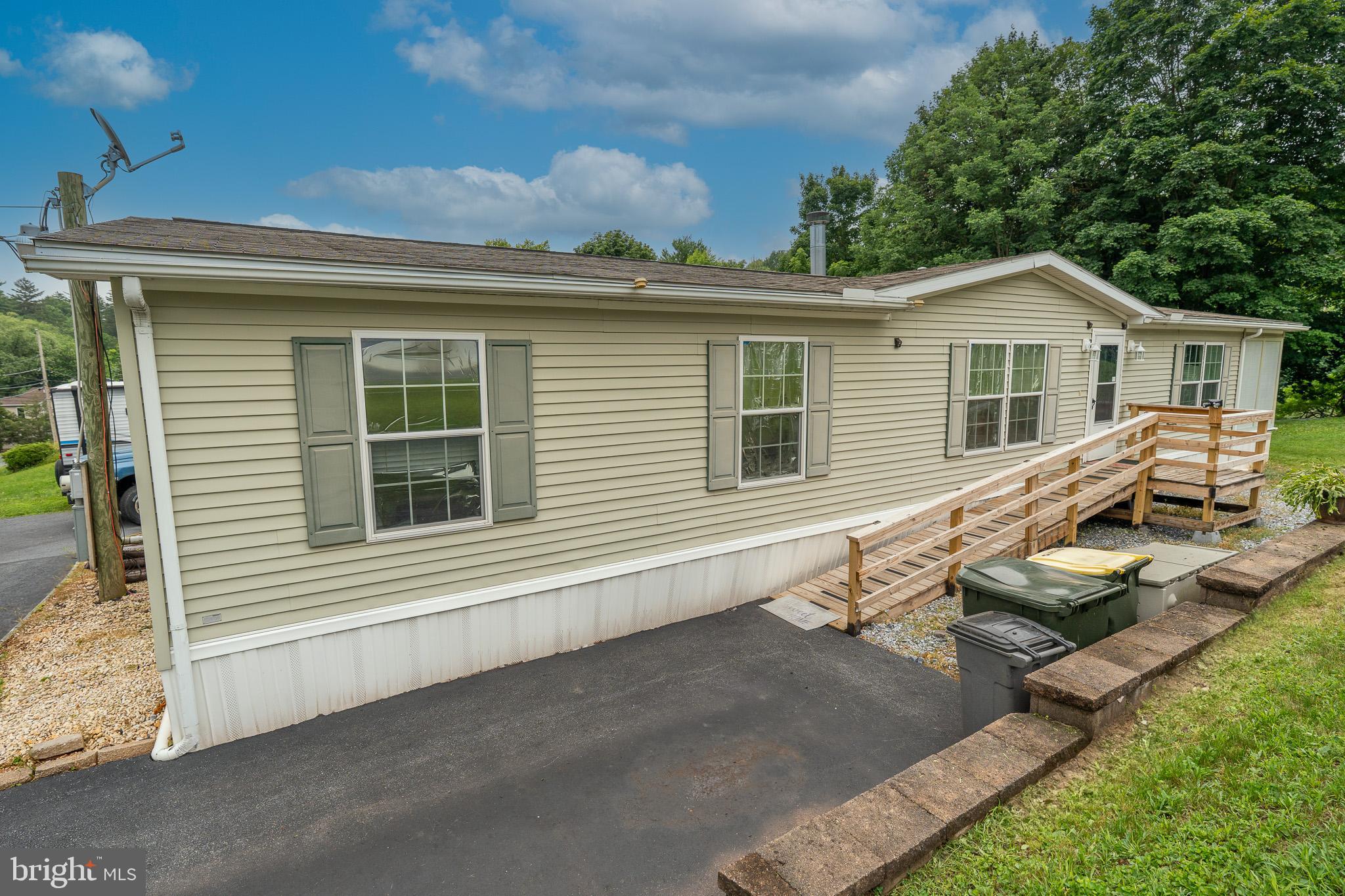 *Contingent on Seller finding suitable housing* *On it's own land! NO LOT RENT*
Welcome to 688 Hopeland Road, a delightful 3-bedroom, 2-bath manufactured home nestled in the peaceful countryside of Lititz, PA. Built in 2008 and offering 1,680 square feet of single-level living, this well-maintained home features a cozy fireplace, central air, and forced air heating for year-round comfort. The spacious layout includes a bright kitchen, inviting living areas, and plenty of room to grow. Set on a manageable .22 acre lot in desirable Clay Township, the property provides a perfect blend of privacy and convenience. Backyard abuts Hopeland Community Park, take a short drive to Lititz, Ephrata, Lancaster or Lebanon! Location doesn't get any better than this, make it yours today!