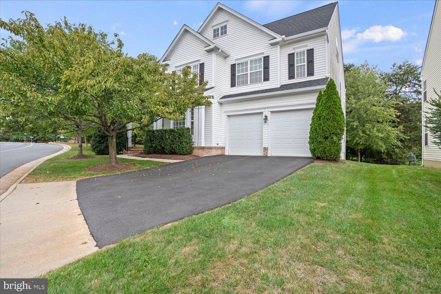 Staggering four level single family home in the sought  after Lochewood community! The roof and water heater being replaced in 2019. Two story Foyer welcomes you at the entrance of this gorgeous house, with a gleaming hardwood floors leads to the formal living and dining areas, plenty of natural sunlight. The huge gourmet kitchen features granite counter top, stainless steel appliances, tile backsplash, lots of cabinets and a space to have morning breakfast. Family room with a fireplace adjacent to the  kitchen with plenty of natural light.  Upper level having a grand owner's suite with a sitting are to enjoy morning tea, his and her walk in closets and luxury en-suite bath with a soaking tub to enjoy, separate vanities,. The 3rd level also ha three spacious bedrooms, 2 full bathrooms , for the convenience laundry is situated at the 3rd floor! Now comes the 4th floor, perfect in-law/au pair suite with a living room, full bathroom and a bedroom with  a walk in closet. Worth to mention the basement is an entertainer paradise, a wet bar, movie theatre, fitness area and half bath, So much more the outside patio is ready to grilling and entertaining  the guests. So close to Rout 28 and 267 toll road.