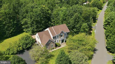 Photo of 8000 Pinnacle Ridge Drive, MANASSAS, VA 20112 (MLS # VAPW2128474)