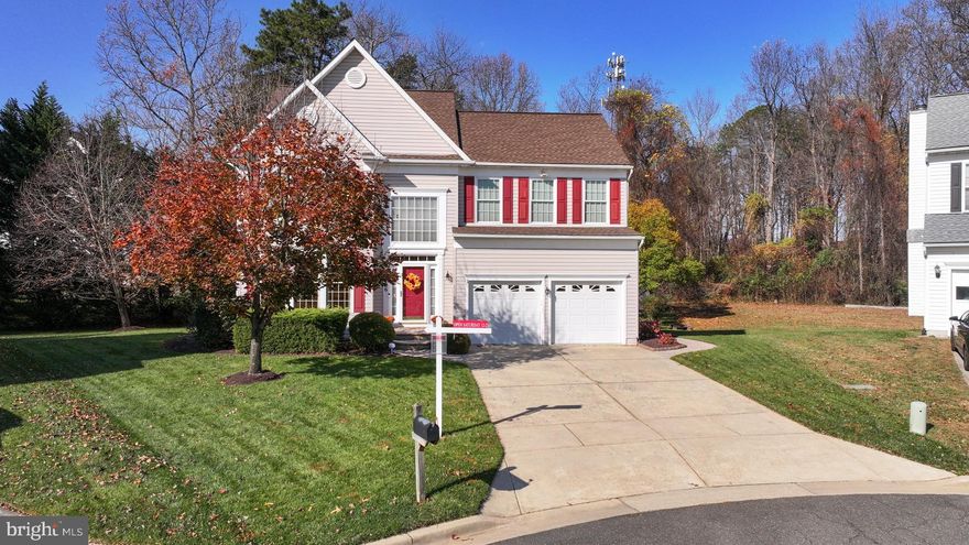 Meticulously maintained and beautifully updated! Nestled in a quiet cul-de-sac and premier location for commuting, this property is the home that you have been waiting for. 
This stunning home offers comfort, style, and functionality throughout. The main level features gleaming hardwood floors, fresh paint, and an open-concept design that seamlessly connects the kitchen and family room—perfect for everyday living and entertaining. The kitchen offers granite countertops, plenty of counter space, and an eat-in area. A private office sits just off the family room, ideal for remote work.

Upstairs, you’ll find spacious bedrooms and a beautifully remodeled primary bath (2022) along with an updated guest bath (2022). Enjoy new carpet upstairs (2023) and on the lower level (2022). The finished walkout basement provides the perfect entertainment space with a bar area, a sauna that conveys, and room for a home office with its own private entrance.

Step outside to your backyard oasis featuring a new deck (2020) and patio (2014) that back to trees for added privacy—ideal for outdoor gatherings or quiet evenings. Additional highlights include a new roof (2020), HVAC (2011), replacement windows (2016), and a two-car garage with extra storage and a double driveway. Conveniently located between D.C and Baltimore and a short distance from BWI and Marc train. Plenty of shopping and dining close by.  Location is perfect for easy commuting.