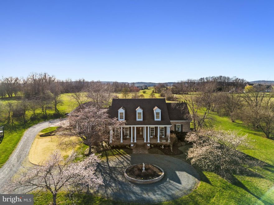 Completely renovated in 2023 this amazing Cape Cod home with just under 12 acres is located in a beautiful Virginia Countryside private setting. Multi gen home and living with primary bedroom suite on the main level with coffered ceiling. Luxurious soaking tub and shower. Hardwood floors throughout both levels. Interior designing touches include lighting, hardware, blinds, window treatments, wallpapering, windows both double hung and casement windows, shiplap and woodworking touches just a sample of items that bring out the beauty of this home. Upper level 4 bedrooms and 3 full baths. Main level laundry, mud room with benches, powder room, huge pantry each with special details. Ah, the kitchen with its huge island, Aga range/oven, SS appliances, soft close cabinets and drawers. Impressive large window views from every room. Family room with propane fireplace. Propane tank 1000 gallons is owned. Lower level with powder room, wet bar, large family room and separate exercise room. A Geothermal heating/cooling and heat pump. New well pump 2020, Upper-level HVAC 2022, Cottage HVAC 2024. The cottage over the garage 850 sqft is special. Hardwood floors, shiplap siding, full bath, kitchen, bedroom, washer dryer.  Private access over three car garage. Breezeway connects the garage to the house. Fenced in back yard with pool with brick patios and sidewalks. New large, covered gazebo for entertaining, Pool has weekly servicing from local pool company in the season. Covered brick front and back porches to enjoy the private setting. So much more here to see that awaits your visit. You will be impressed. New architectural roof being installed next two weeks. Windows in Garage are being replaced and five more in the house. Many inside house have already been replaced. All trim and siding being painted this week.