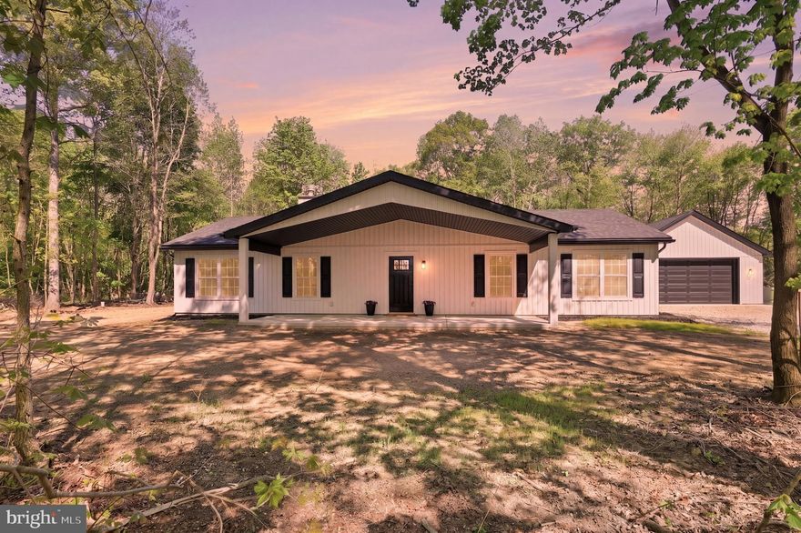 Meticulous, quality, NEW construction secluded on 2.25 acres wooded parcel!  It TRULY does not get much better.  This property is perfect for anyone who wants new and fresh and PRIVATE.  As you drive past, you may not notice this little slice of heaven as it sits off the street and his fully wooded.  It features a brand new home built by Tidemark Construction.  Tidemark is know for their high quality commercial work.  They have brought that quality into a residential piece of artwork this time.  This design features an open floorpan that showcases a very upscale, country kitchen with a large center island workspace and bar top.  The kitchen is open to the great room which does have room for a dining room table, couches, etc.  All this makes for a very cozy living area that is enriched by a beautiful custom fireplace.  The master suite is large and features dual walk-in closets and a luxury owners bathroom.  The master also has access to the rear exterior of the home.  Two additional bedrooms complete the home as far as sleeping or working.  Additionally there is a large pantry and separate laundry room.  The owner has also thought ahead and built a remarkable, oversized, detached garage that has a heated closet, electric and plenty of room to work on "big boy toys" or woodworking or something of the sort.  Outside has a patio and some landscaping but is also a blank canvas waiting for your dreams to become reality.  Now is your chance to own your private, luxurious homestead.