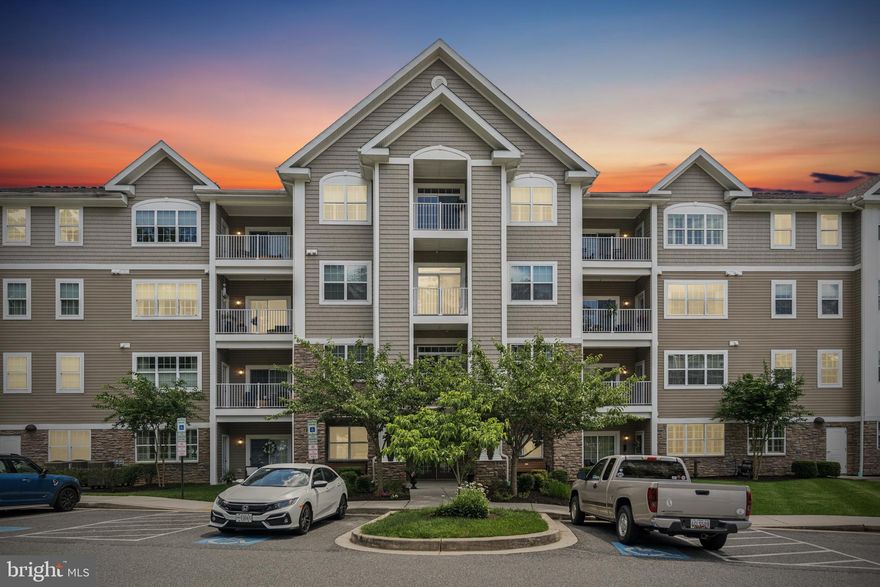 Welcome to 901 MacPhail Woods Crossing, a quiet third-floor condo tucked into one of Bel Air’s most desirable 55+ communities.

This unit checks a lot of boxes…you’ve got elevator access, an assigned parking spot, and one of the best features? It backs to the woods, so your view is nothing but trees and privacy.

Inside, the layout feels open and inviting. The kitchen has tons of cabinet space, stainless steel appliances, and a wraparound breakfast bar that opens right into the living and dining area. It’s great for entertaining or just having a comfortable everyday space. Hardwood floors run throughout the main living areas, and there’s even a fireplace for a cozy touch.

The bedrooms are nicely sized, with the primary suite offering a walk-in closet and a large bathroom with double sinks and a walk-in shower. There’s also a second full bath and a laundry room with a full-size washer and dryer.

One of the best parts? Step out onto your private balcony and you’re surrounded by trees,it’s peaceful, quiet, and a perfect spot for your morning coffee.

This is low-maintenance living in a well-kept elevator building, just minutes from shops, restaurants, and everything you need in Bel Air.