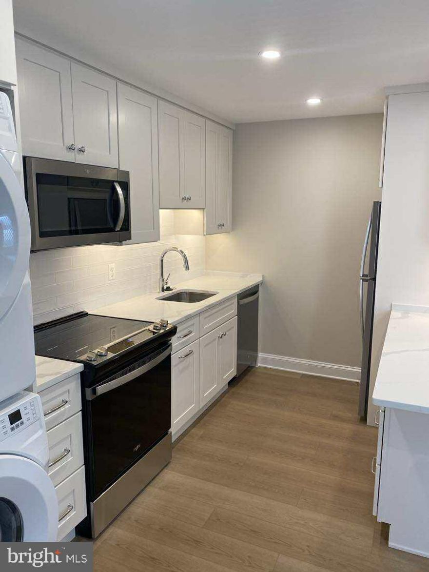 This completely renovated (2025), second floor efficiency apartment has been fully remodeled and is ready for you to call home. Every detail has been carefully considered, from the brand-new appliances (including a dishwasher, stacked washer/dryer, refrigerator with icemaker, and electric stove) and enough room to to unwind in your living room. You'll love the efficient mini splits, ample cabinets, kitchen bar and the beautifully designed bathroom that adds a touch of luxury to your daily routine. This apartment is designed for ease of living, requiring minimal upkeep, so you can focus on enjoying your space. Located close to downtown Charles Town and a quick run to the Martins. Credit check required (650), three times the monthly rent in income, and no evictions. Please note: Absolutely no pets or smoking/vaping! Please submit applications on Zillow**