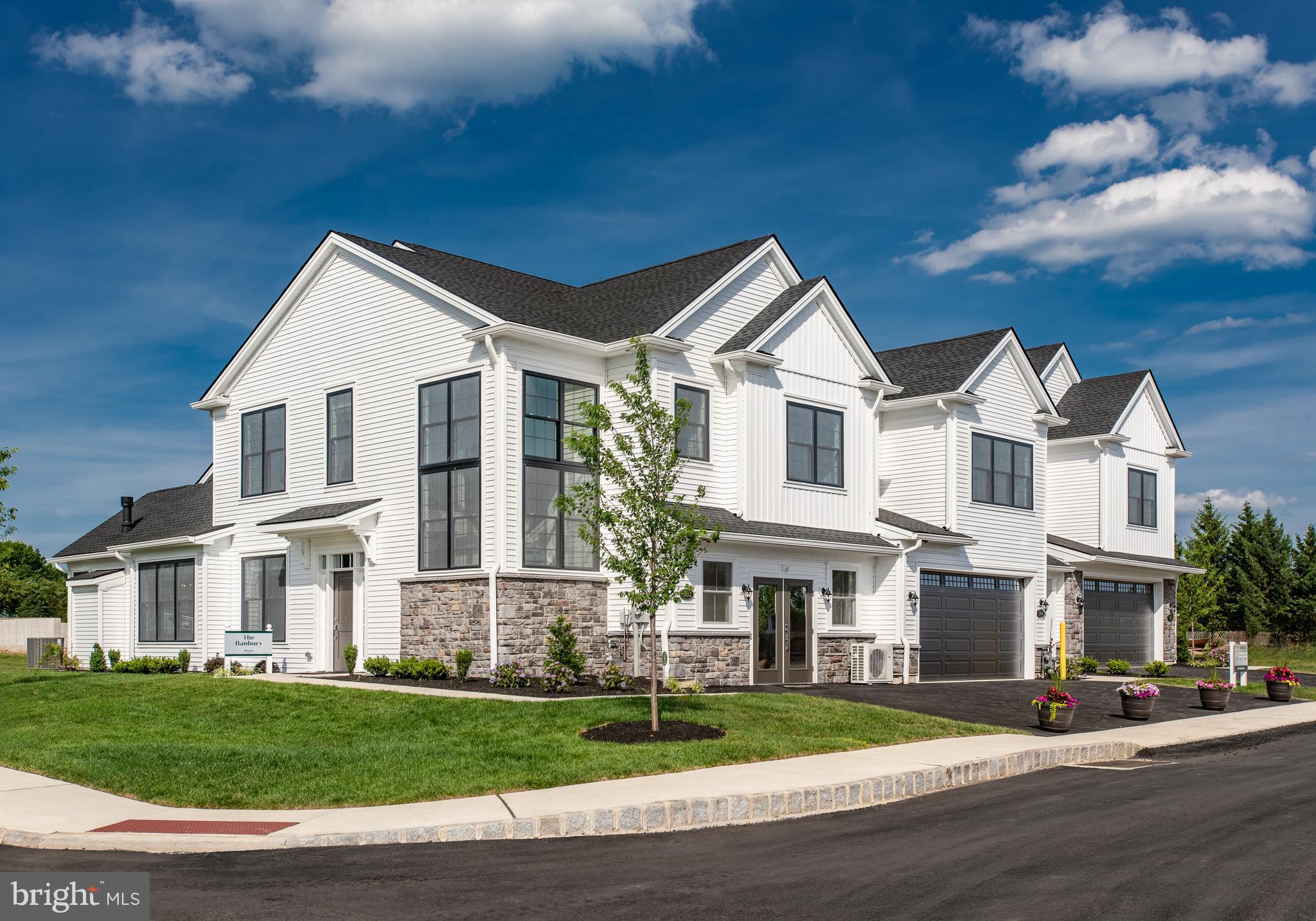New Release - Lot 25 - Banbury Corner Model unit.
WELCOME TO BARCLAY HILL - DeLuca Homes newest 55+ Community. Model Homes tours are available every day 10am-4pm. Also quick delivery homes are available today with great pricing! Banbury model with a daylight basement and deck. Welcome to your future home, where luxury and modern convenience blend seamlessly. This exquisite residence offers a range of premium features and high-end finishes designed to elevate your living experience. Step into the primary bedroom, a serene retreat highlighted by a sophisticated tray ceiling. The gourmet kitchen is a chef’s delight, featuring an enlarged island perfect for meal prep and casual dining. Equipped with top-of-the-line KitchenAid appliances, Century cabinetry, and under-cabinet lighting, this kitchen is both functional and stylish. The ceramic tile backsplash and upgraded stone/quartz countertops add a touch of elegance to this culinary haven. The home features oak stairs with painted risers, adding a classic touch to the contemporary design. Hardwood flooring runs throughout, with upgraded carpeting in bedrooms 2 and 3 for added comfort. Recessed lighting throughout the home provides a sleek, modern ambiance, while pre-wiring for ceiling fans in all bedrooms and the family room ensures year-round comfort. A spacious 9ft unfinished daylight basement offers endless possibilities for customization, complete with rough plumbing for a future full bath and access to a deck for outdoor enjoyment. The ceramic tile floor in the laundry room ensures durability and ease of maintenance. Additional features include a garage door opener with a keypad for convenience and security, as well as ceramic tile in all bathrooms, paired with upgraded stone/quartz countertops for a luxurious touch. This home combines style, functionality, and luxury in every detail. Don’t miss the opportunity to make it yours and experience the pinnacle of modern living. Schedule a viewing today and discover all the exceptional features this property has to offer. Home Warranty included. Call Nick Directly for any showings.
