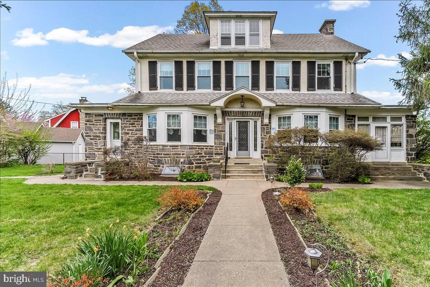 Welcome to 216 E Manoa Rd, a spacious and charming center hall stone colonial in Havertown. This 4-bedroom, 1.5-bathroom home offers room to grow, timeless appeal and endless possibilities.
The interior features original hardwood flooring with walnut inlay throughout the first floor, first floor powder room, first floor office or library with its own entrance AND a window filled sunroom (heated)  for evening movie nights or curling up with a book and blanket!
Entertain in the fireside living room and host memorable meals in the formal dining room. There is also a second dining area off the kitchen that, with a bit of vision, can be combined with the bright and welcoming kitchen. This would make for quite an impressive gourmet kitchen! The classic and beautiful staircase with stained glass windows lead you to the second floor with 4 bedrooms and a full bathroom. The walk up floored attic is such an impressive space that can be made into a primary ensuite, two additional bedrooms or whatever your needs require!
Step outside and enjoy the outdoor deck, ideal for entertaining or simply unwinding after a long day. Additional conveniences include a full basement offering extra storage space, private parking with a detached 2 car garage, and street parking for guests.
This property offers a wealth of possibilities enhanced by its inviting layout and thoughtful design. In addition, it is super close to transportation, major roads, schools, parks yet still has a private and peaceful feel. Whether you're seeking comfortable everyday living or a space to host gatherings often, this is the one!