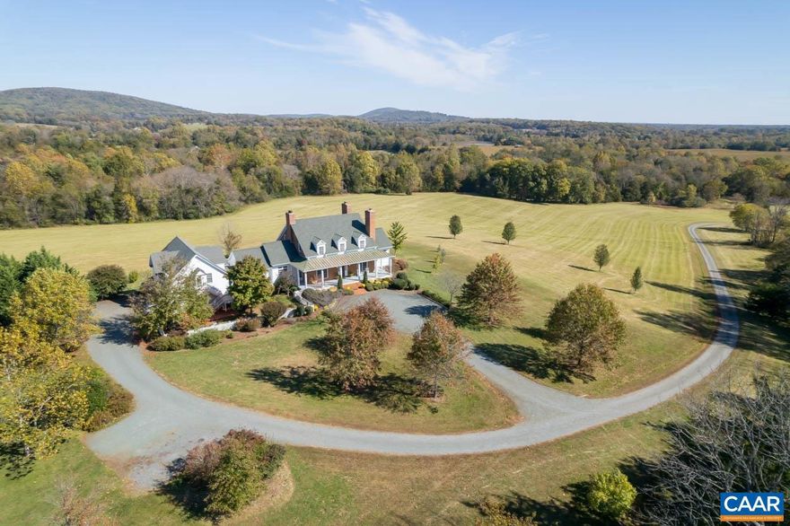 New price adjustment! Chanticleer Farm sits on 55+ acres in Keswick with unobstructed views of the surrounding countryside. Custom designed and built, the home features an open-concept living room, family room, and dining spaces bathed in natural light. Don't miss the stylish library or quiet home office. The true gourmet kitchen has a Bertazzoni gas range, double wall ovens, two farm sinks, two dishwashers, and an oversized brick cooking fireplace w/raised hearth & custom iron work by renowned blacksmith Stephen Stokes. The primary suite has stunning vistas, a sitting area w/ fireplace, and spacious bath w/ heated floors. The terrace level is fully on-grade and offers flexible uses including a rec/media room, additional guest rooms, home office or gym. The main house has seven fireplaces w/ hand-carved mantels, hardwood floors throughout, a geothermal furnace for efficient heating & cooling, and ample unfinished storage space. Various covered porches, decks, and outdoor living spaces abound. No detail has been forgotten in the 2 bed/1.5 bath guest cottage above the 3-car garage. The property is nestled among Central Virginia's most revered historic sites, prestigious estates, and beloved wineries. 15 miles to Charlottesville.,Glass Front Cabinets,Granite Counter,Wood Cabinets,Fireplace in Dining Room,Exterior Fireplace,Fireplace in Family Room,Fireplace in Kitchen,Fireplace in Living Room,Fireplace in Master Bedroom,Fireplace in Study/Library