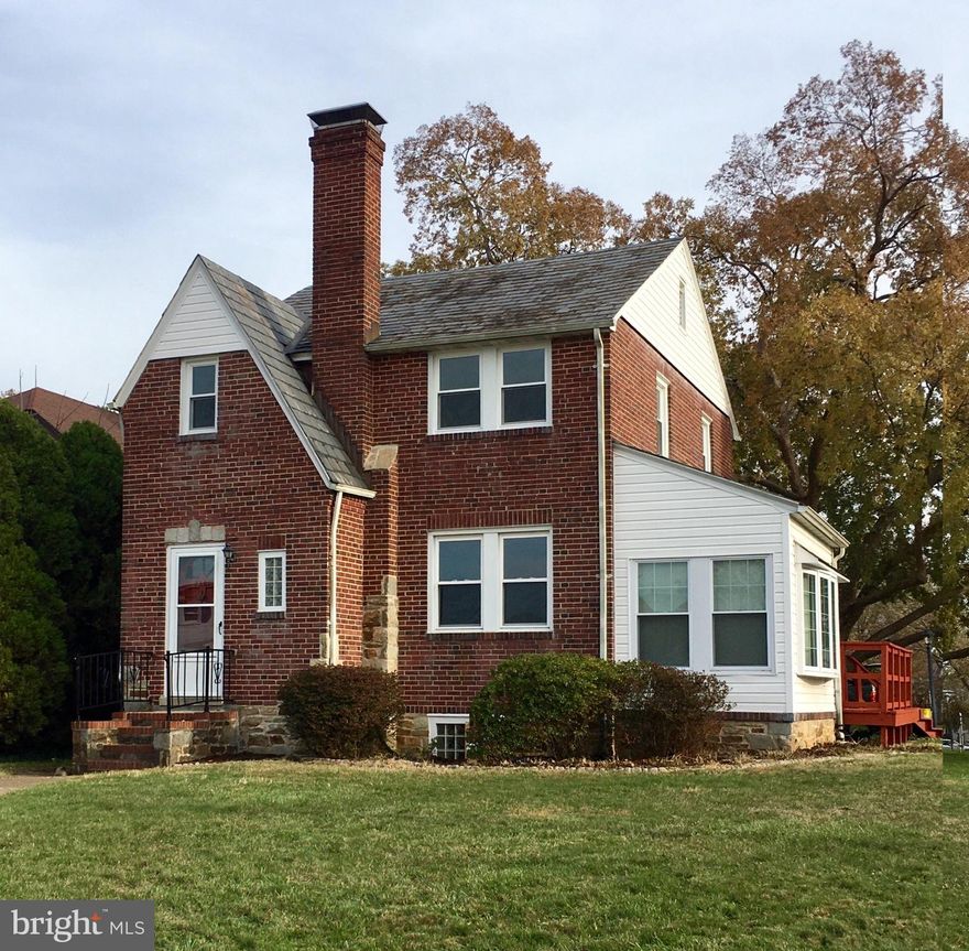 RARELY AVAILABLE ALL BRICK COLONIAL W/ SLATE ROOF AND CHARACTER GALORE FROM THE ARCHED DOORWAYS  + CROWN MOULDINGS TO THE NEWLY RENOVATED KITCHEN WITH  CHERRY CABINETS AND GRANITE COUNTER TOPS.  ENJOY THE WARMTH AND ELEGANCE OF THE ORIGINAL FLOOR TO CEILING STONE FIREPLACE .   FLOOR PLAN HAS BEEN EXPANDED WITH THE ADDITION OF THE BRIGHT AND COZY, SOUTH FACING SUNROOM, WITH  ITS NEWER BOW WINDOW WHICH CAN SERVE AS AN OFFICE OR PLAYROOM.   HIDEOUT IN THE NEWLY DRY-WALLED  BASEMENT WITH RECESSED LIGHTS AND PERGO FLOOR WHER YOU WILL ENJOY THE GLASS BLOCK WINDOWS WHICH GIVE THE PRIVACY WHILE THE SUNLIGHT FLOWS IN.  UPSTAIRS  BEDROOMS FEATURE GLEAMING HARDWOODS  AND SOME BUILT- INS, INCLUDING THE CLOSET SPACE.  THE TASTEFUL DECOR FLOWS INTO THE RETRO BATHROOM WITH ITS WAINSCOTTING AND PORCELAIN TILE.  RECENT UPGRADES INCLUDE THE ELECTRICAL SYSTEM ELECTRICAL  , FRENCH DRAIN AND NEWLY INSTALLED REPLACEMENT WINDOWS + 13 YEAR YOUNG BOILER, YOU'LL HAVE TIME TO  SIT IN FRONT OF THE WOOD BURNING FIREPLACE OR PLAY IN THAT BASEMENT RECREATION AREA.  WHILE NOT MUCH MORE YOU CAN DO INSIDE, TRY YOUR GREEN THUMB ON THIS LOVELY CORNER FENCED-IN LOT OR ENTERTAIN ON YOUR WRAP AROUND DECK.  YOU'LL APPRECIATE THE OFF STREET PARKING IN MOST CONVENIENT LOCATION NEAR PARKVILLE SHOPPING CENTER AND MINUTES FROM 695 AND  TOWSON OR WHITEMARSH.   iF THE STORAGE SHELVES IN BASEMENT OR THE ATTIC IS NOT ENOUGH, THEN YOU HAVE 2 EXTERIOR SHEDS AS A BONUS.  THIS HOUSE IS WHAT "CHARM CITY" IS ALL ABOUT WITHOUT BEING DOWNTOWN!FIRST TIME BUYERS MAY QUALIFY FOR $5,000 GRANT WHICH CAN BE APPLIED TOWARD DOWNPAYMENT AND/OR CLOSING COSTS AND IS ENTIRELY FORGIVEN AFTER 5 YEARS OCCUPANCY