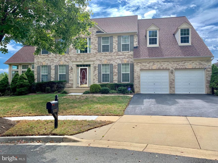 THIS ONE CHECKS ALL OF THE BOXES...SPACE SPACE GALORE! There is room her for ALL of your needs. Formal living and dining area with a morning room and we haven't even made it to the kitchen with new flooring granite and stainless steel GE appliances! The main level also has a family room off of the kitchen with endless windows filling the home with natural light. Office on main level with a half bath!! 4 bedrooms and 3 baths on the upper level with a massive master suite with sitting area walk in closet and soaking tub. As if that wasn't enough finish this all off with a fully finished walkout  basement with two bonus rooms a full bath a full wet bar with seating for 8 and a family room with fireplace.  ALL THAT YOU'VE EVER WANTED!  HURRY THIS ONE WON'T LAST LONG!