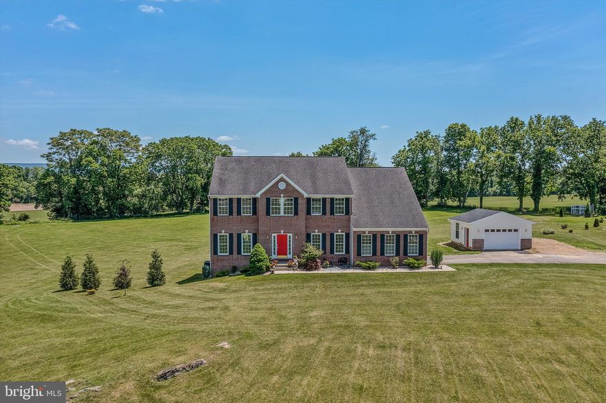 Welcome to living in picturesque Shepherdstown, WV! This colonial residence boasts an impressive 5 bedrooms, 4 full baths, and 1 half bath, featuring almost 5000 finished sq. ft. of living space, providing ample space to accommodate your household's every need. With its inviting brick front, attached and detached garages, and meticulously finished basement, this property seamlessly marries functionality with style.

What makes this property unique is the 7+ acre lot adjoining a 174-acre farm protected by a Conservation Easement. This serene retreat removes the hustle and bustle of city life, ensuring privacy and tranquility. Picture yourself waking up to breathtaking views of rolling hills and lush greenery. Can you imagine it? 

The community is less than 3 miles from Shepherd University, Shepherd University Wellness Center, and Historic Shepherdstown, WV.  A 30-mile commute to Frederick, Md, or  Leesburg and 5.2 Miles from Duffields Marc Train Station.  This prime real estate is also near the newly established Shepherdstown  Public School Campus, which is projected to open in 2025. Residents can enjoy the benefits of educational institutions and several amenities nearby.

Whether you're an outdoor enthusiast eager to explore the nearby river sports, hiking, and biking trails or a culture aficionado looking to immerse yourself in the vibrant arts scene, Shepherdstown offers something for everyone. Indulge in a leisurely stroll through the historic downtown area, brimming with charming boutiques, quaint cafes and restaurants, and eclectic galleries, or unwind with a scenic picnic by the Potomac River or local community park.

As the sun sets over the horizon, retreat to the comfort of your own sanctuary, where tranquility creates an unparalleled living experience. Whether you're hosting lavish gatherings in the spacious living areas or unwinding with loved ones in the private outdoor oasis, every moment spent in this well-appointed home will surely be cherished.

Don't miss out on the opportunity to make this dream home yours! Contact us today to schedule a private viewing and take the first step towards embracing the unparalleled lifestyle that awaits you in Shepherdstown, WV. Your perfect home awaits – seize the moment and make it yours today.