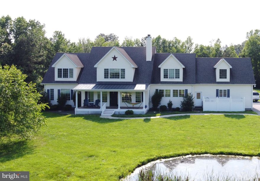 ..............................THIS..................................IS......................................IT!!!..............................

THE DREAM HOME YOU HAVE BEEN WAITING FOR!!!                                  
Nestled in the serene tranquility of Tunis Mills, this exquisite Cape Cod residence offers a harmonious blend of luxury and comfort, set against a backdrop of picturesque rural beauty. Spanning over 3,500 square feet, this meticulously crafted home is designed for those who appreciate high-end living and the tranquility of nature. *-*-*-*-*-*   This 4 bed/3.5 bath custom-built home sits on 7.49 sprawling acres with a 40'x40' pole building.  Your experience begins in the large, open kitchen/dining area that any chef will love!  Natural light floods the space through skylights, enhancing the warm ambiance throughout. Next, step thru the doorway into the extremely spacious family room where you can relax by the wood burning fireplace, entertain friends & family, set-up a corner office....so many possibilities with the space in this room.    Off the family room you will find the first of two primary suites.  The second primary suite is at the top of the stairs where you will also find the remaining 2 bedrooms, a full bath, laundry AND a bonus room that spans the length of the garage & could be that 5th bdrm you need, extra storage, playroom.....or???? whatever you desire.  ALL of the bedrooms (& the bonus room) in this home are HUGE, offering space for 2+ KING-SIZED beds, furniture & big window's that overlook the property on all sides.*-*-*-*
The heart of the home extends outdoors, where a charming porch and expansive back deck invite you to unwind while soaking in the stunning views of the surrounding pasture, pond, and wooded areas. *-*-*-*The property spans an impressive 7.49 acres, offering ample space for outdoor activities, gardening, sports or simply enjoying the peaceful rural setting.  For equine enthusiasts, this property is a perfect canvas ready to build the equestrian facility you have always envisioned!!  The home sits near the back corner of the property, leaving you with plenty of wide-open pastures for your horses to graze.*-*-*-*WAIT --- THERE's MORE TO LOVE.....88 SOLAR PANELS tucked away at the tree-line will keep your monthly electric bills SO LOW, (currently around $25/mo.) you won't know what to do with all the $$$ you'll save   AND yearly there's about a $1500 solar credit back to the owners.....YES, you read that right - the SOLAR PANELS are OWNED FREE & CLEAR and are included in the sale of the home!!!!  *-*-*-* AND EVEN MORE. TO ENJOY.... just 1/2 mile away you have public access to a boat ramp where you can put in your kayak, canoe or small boat and spend the day on the water!!!*-*-*-*-*-*-*-*-*-*-*