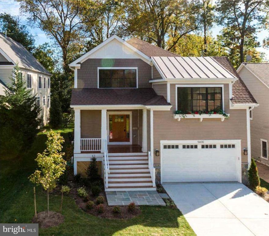 Gorgeous new Craftsman Hardiplank home by Bo Bud Construction in desirable Over Lee Knolls. Three finished levels, extensive hardwood throughout.  Open floor plan on main level. Granite/stainless/hardwood cabinets in kitchen. Jenn Air appliances. Gorgeous trim throughout, generous room sizes. Walk-out lower level.  Large deck.  Close to East Falls Church Metro. Porch & Steps are being refinished.