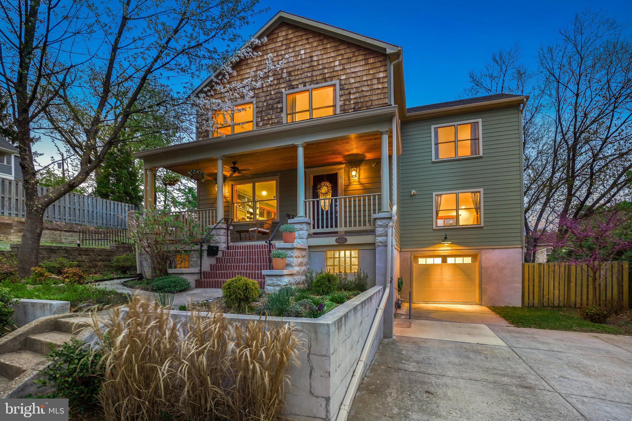 Make sure to check out our 3D Virtual Tour! Welcome to this stunning contemporary Craftsman Colonial. With a picturesque covered front porch to greet you, this exceptional home seamlessly blends comfort, design, and an abundance of elegantly presented spaces - room for all your pursuits! All under a mile from the Takoma Metro Station, and with even closer proximity to nearly every amenity in town, this home offers an unbeatable location paired with a spectacular, light-filled interior.
Natural light, handsome wood trim and millwork, recessed LED lighting, Pella windows, and gorgeous wood flooring create a warm and inviting atmosphere. The open-concept main level is designed for both everyday living and entertaining. The living room features a gas log fireplace flanked by built-in display shelving. The large dining area is adjacent, complete with a stylish bar, wine rack, and a striking spoked chandelier. The chef’s kitchen flows seamlessly into the spacious family room with custom built-ins and sliding glass doors leading to the rear deck. The kitchen is a dream, featuring stainless steel appliances, a five-burner gas range, stunning solid-surface countertops, rich hickory cabinetry, a wine refrigerator, pendant and recessed lighting, and an expansive prep area. A magnificent red pine staircase and a powder room complete the main level.
Upstairs, four spacious bedrooms include a luxurious primary suite with a private balcony overlooking the tiered backyard, two walk-in closets, and a spa-like en-suite bathroom. The primary bath, accessed through a beautiful pine barn door, offers a glass-enclosed shower, a jetted soaking tub, bidet, and two separate vanities. This level also features a hall bathroom, a convenient laundry closet, and a deep linen closet.
The lower level provides even more living space, including a mudroom area, a large recreation room/gym, a bonus room/office, a full bathroom, a guest room, and access to the garage, featuring a wall of workbenches, independent heating, and an EV charger.
Outside, enjoy the charming front porch with copper trim and a tongue-and-groove ceiling. The backyard features a two-level deck, a storage shed, a rain garden, and beautifully landscaped grounds. The exterior is clad in Highline LP SmartSide Trim and Siding, offering both durability and striking curb appeal. A private driveway provides ample parking.
Situated in the heart of eclectic Takoma Park, this home offers easy access to a vibrant community with shopping, dining, and entertainment just moments away. Enjoy the Farmers Market, Takoma Beverage Company, Busboys and Poets, Old Takoma Ace Hardware, Cielo Rojo, and Takoma Urban Park—all within blocks. With neighborhood traditions like summer block parties, Halloween gatherings, and a beloved Turkey Fry, this home offers a lifestyle of connection and convenience. Come enjoy it all!