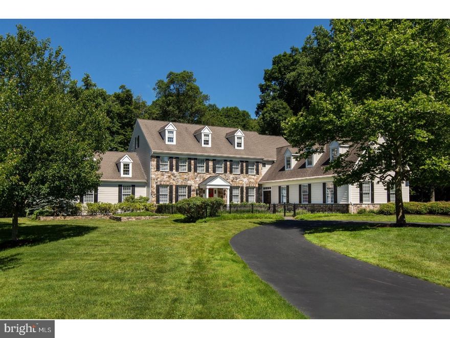 Set majestically at the end of a cul-de-sac on 4.89 acres in Solebury Township, this custom-built Glen Hess residence showcases almost 6,000 square feet of beautifully appointed interiors and entertaining spaces that will make your home a hub for fun and relaxation in every season. Three finished levels, 4-5 bedrooms and 4.2 baths, a salt water pool and spa served by a custom outdoor kitchen and bar, finished lower level, 3-car attached and 3-car detached heated garages and many other amenities are move-in-ready at this well-appointed, center-hall home. Step inside to pristine hardwood floors, extensive millwork and dramatic volume ceilings. Pella windows and French doors and custom lighting create spaces awash in light. The foyer with split staircase leads to a formal living room and dining room, which includes a butler's service area. A timeless, well-designed chef's kitchen is outfitted with rich cherry and antique white cabinetry; pro-grade Asko, Sub-Zero and Viking appliances and neutral tile and granite finishes. The kitchen is open to a large casual dining area and a double-height family room with floor-to-ceiling stone fireplace and rear staircase. A library/study is finished with custom cabinetry and French door to a terrace. On the far side of the house is an enormous great room with big Palladian windows. Private quarters include a main bedroom suite with sitting room, gas fireplace, walk-in closets and a full bath with jetted tub and shower. Across a landing area are three large bedrooms with two full baths and closets with built-ins.  As a bonus, the lower level is finished with a large common space, a bedroom, full bath and second laundry to supplement the first-floor laundry room. But saving perhaps the best for last, the outdoor entertaining spaces are dynamite! Protected by a standing-seam copper roof, this Charles Weiler-designed space provides a full wet bar, built-in grill, serving bar, refrigerator, ice maker, and built-in banquette, plus freestanding stone fireplace. All is adjacent to a heated salt water pool/spa. So much to enjoy in one property, all in the desirable New Hope-Solebury School District. Exterior has been updated with Hardie Plank and interior recently painted.