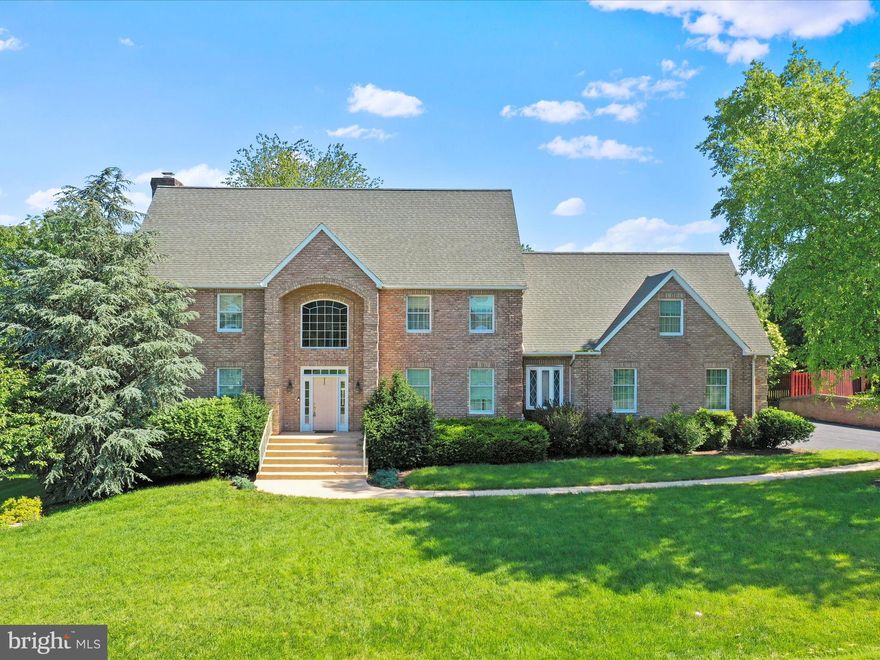 Welcome Home to this beautifully maintained, all-brick colonial in Black Rock Estates! Boasting over 3,500 sq.ft. of living space and situated on 0.56 acres of land. Featuring 4 bedrooms, 2 full bathrooms, and 2 half bathrooms. Th main level greets you with a grand foyer that leads to a spacious living room and a cozy family room featuring a gas fireplace — perfect for relaxing and entertaining. The formal dining room offers an ideal space for hosting, while the eat-in kitchen provides gorgeous granite countertops, cooktop, wall oven, a breakfast bar, and an additional dining area. Convenience is key with a main level laundry room and a half bath. Upstairs, you'll find the generously sized bedrooms, all with plush carpeting. The primary bedroom has double walk-in closets and a private en suite bath complete with a soaking tub and a separate shower. Need extra space? The office above the garage provides a quiet retreat for work or study. The partially finished basement is designed for both relaxation and recreation, featuring a family area, a half bath, and a workout room. Enjoy the outdoors on the large deck in the backyard, perfect for grilling or unwinding in privacy. Located just minutes from Black Rock Golf Course, parks, shopping, dining, and convenient access to Interstate 70. Don't miss the opportunity to make this your own -- schedule your showing today!
