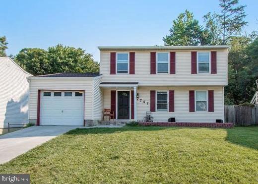 Major Renovations in 2020 include Remodeled Primary Bathroom, HVAC System / Air Handler, Roof, Gutters and NEW Flooring / Carpet in Bedrooms & Luxury Vinyl in Basement & Laminate in Bathrooms. Lights Upgraded with LED Energy Efficient lights in the Living room, Kitchen, Basement, Upstairs Hallway & Laundry Area. Fresh Painted 3 Bedroom / 2.5 Bath Single Family Home. Hardwood Flooring through out Main Level including the Kitchen that features Stainless Steel Appliances and enough space for a Table. Separate Dining area right off Living Room. Large Primary Bedroom with own Private Bathroom. Additional 2 Very Spacious Bedrooms with new carpeting. Large Basement / Rec Area with New Luxury Vinyl Flooring, plenty of space for Game / Hobby Area and an additional Family Room and Laundry Room. Large Backyard with Privacy Fencing and large Deck, perfect for Entertaining, backing to Woods. Plenty of Parking with the 1 Car Garage and Driveway big enough for 2 additional cars. Close to major routes and shopping. 30 Minutes to Fort Meade / Annapolis & Baltimore.