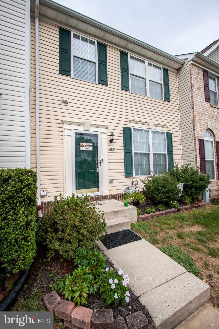 Completely updated home in the very popular Monmouth Meadows Community.  This large townhome includes 3 Bedrooms, Office/Den, 3 Full Baths and 1 Half Bath.  This beauty features hardwood throughout the main level, new carpet on the second level and a brand new finished lower level.  The large master bedroom offers 2 walk-in closets and a huge Master Bath complete with a double sink vanity, large Jacuzzi soaking tub and separate shower.  The new lower level boast Pergo wood flooring, full bath and complete wet bar with built in counter refrigerator.  To top off this gem you can walk to the local library, school and community pool.  With convenience to all major commuter routes, shopping and recreation this is sure to move quickly.  Schedule your showing today!