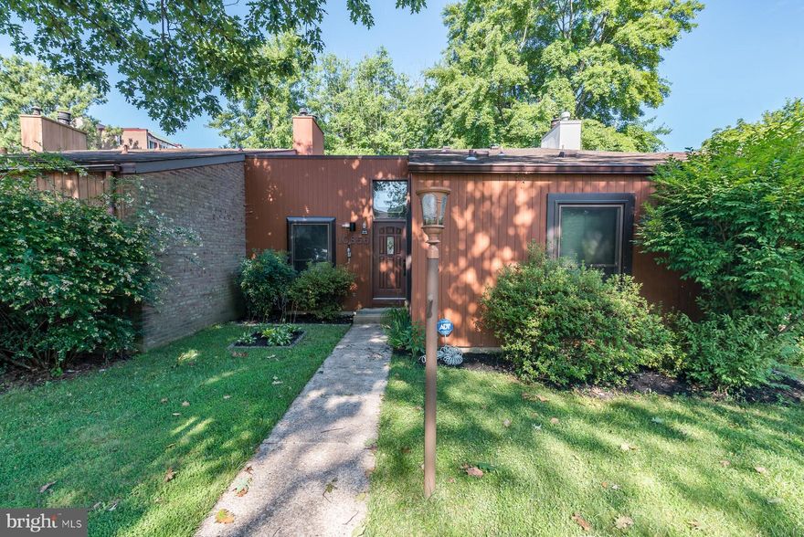 Welcome home to this wonderful Columbia townhome offering an open and spacious floorplan. The updated eat-in kitchen features granite counter tops and a center island with breakfast bar. The main level office with built-ins overlooks the cozy family room boasting vaulted ceilings and a wood burning fireplace. The sun-drenched Primary Bedroom is sure to impress with vaulted ceilings and an en-suite bathroom. All of this while being only minutes from major commuter routes, retail, restaurants, and more.  No COA fee!