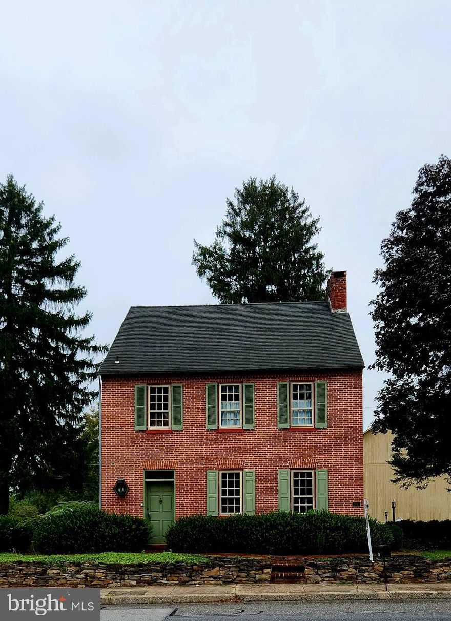 Step into history by entering this prominent 18th century Federal Style home. Built in 1750 by Samuel Fahnstock who also built the famous Harper’s Ferry Bridge. The home was honored in 1990 by the Historical Gettysburg Adams County Society as the Jacobs Farm. Originally a dairy farm located in the quaint town of East Berlin. This home has 2,245 sq.ft, 3 spacious bedrooms, 2.5 baths, eat in kitchen, family room, formal dining and living room and 3 seasons porch with a swing there bank barn and chicken coop all sitting on a 1.04 acre lot. There is wood molding and floors throughout. There are fireplaces in many of the rooms, built in cabinets and bookshelves as well. The bedrooms are located on the 2nd floor which can be accessed by using the wooden stairs and original banister. There is also a chair lift which can be removed if desired. You access all the bedrooms from the 2nd floor hallway. The master bedroom has an attached full bath with a walk in shower. There is also a stand up washer and dryer and a large closet. You access a large cedar closet and attic which was used for storage. From the hallway you can climb 2 steps to the 2nd and 3rd bedrooms and master bath. You can also climb a few steps to the 3rd floor where there is a small room that was used as the workman’s room back in the days. There is a magnificent front door that has its original hardware. To the right of the door is a large corner cabinet. If you enter through the side door of the house you will enter the 3 seasons room which allows you access to the eat in kitchen which also has an impressive wooden door with original hardware. As you exit the 3 seasons room and turn left you walk down a charming brick walkway facing a large bank barn. It has a stone and brick foundation and was stick built. It has hewed wood beams that were pegged together and has a metal roof. In the early days it was known as the largest bank barn in Adams County and was used for community meetings and dances. The previous owner, the renowned Folk artist, Arthur Glazier, known for such works as The Peaceable Kingdom, Victorian Santa’s, Noah and the Ark, had his art studio in the lower level. Today the barn offers parking for your vehicles in both the lower and upper levels and there is plenty of off street parking. There is a chicken coop which Arthur used to stage his wooden boards and sleds, iron boards, chests, Etc that he used for his paintings. You can access the property from either the front entrance off of E. King St. or North St. which is an alley that runs behind the bank barn and coop. The property is within walking distance to the drug store, bank, restaurant, pizza shop and Rutter’s gas station. This is a once in a lifetime opportunity to own a piece of history. You are within driving distance of medical centers in York, Hershey, Gettysburg, Hanover. It is also near many attractions, shopping centers and Antique stores located in Hershey, York, Gettysburg Hanover and New Oxford. Easy access to major highways examples are PA Turnpike, RT # 30, 15, 81, 83 and 94. Directions: From Camp Hill take Rt 15 south 16.6 miles, exit 94 south towards Hanover, make left East Berlin Rd PA 234 for 3.9 miles go through light continue on East King for .9 miles property on left.
