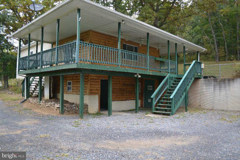 Augusta, WV real estate, this ranch home features 2 bedrooms & 1 full bathroom w/1,056 sqft of living space. This home includes an open floor plan with large kitchen & generous cabinet space. Outside you will find huge wrap around deck, gorgeous mountain views, all on 6 acres of land. Purchase for as little as 5% down, approved for HomePath and HomePath Renovation Mtg Financing.