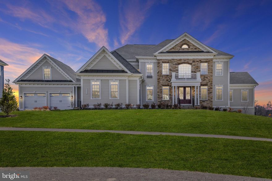 JUST LIKE BRAND NEW - GORGEOUS LUXURY ESTATE HOME BUILDERS NV HOMES CLIFTON PARK II IN SOUGHT AFTER WILLOWSFORD ON A ALMOST AN ACRE PREMIUM LOT WITH PREMIUM UPGRADES THROUGHOUT THE HOME!  This home is an epitome of luxury, bespoke craftsmanship details and indeed one spectacular HOME a Rare Opportunity with 7 Bedrooms , 6.5 Bathrooms , Fully Finished and 4 Car Garage. Step into Luxury from the beautifully landscaped front yard into this welcoming two Story Grand Entrance with Grand French Doors. 10' Ceilings and STUNNING  LVP Flooring throughout the Main Level. Formal Living & Dining Rooms on either side of the foyer. FEATURING A BUTLER'S PANTRY in between Kitchen and Dining. The spacious/bright family room is perfect for entertainment and comfort with a custom built in stone cozy fireplace and floor to ceiling 2 story Large Windows. The rear of the house opens into a generous modern ELEGANT WHITE CHEF's DREAM gourmet kitchen with FARMHOUSE DOUBLE SINK,UPGRADED TILE, UPGRADED QUARTZ COUNTERTOP ,SOFT CLOSE CABINETRY, PROGRAM DOUBLE WALL OVEN, COOKTOP VENT WITH A REMOTE, STAINLESS STEEL upgraded appliances plus Upgraded Quartz countertop /  tile backsplash and an extra- large  quartz Island along with a huge 2 WALK-in shelf pantry. Plus an additional dry bar to pour out some cocktails. The Second Entrance has a spacious built in shelf for the MudRoom and 1 of the 2nd laundry Room with Cabinets and a sink.The open floor plan is designed for ample space for eating and sitting by flowing into the bright bump out morning room connected by French Doors into your very own private covered balcony/porch .On the other side of the main level is a Large Office with French doors, a Powder Room, & Spacious Guest Suite w/ a Walk-in Closet & Full Bath w/ a Double Sink. Retreat Upstairs from either side of your dual Staircases  in your Owners Suite featuring a Sitting Area, a Walk-in Closet and your own private covered balcony. Enjoy the Spa Like Owner’s Bath with upgraded double vanities cabinets, walk-in shower with a frameless shower stall with a bench & 2 Shower Heads plus 4 body sprays as well and soaking tub to relax into tranquility. The upper level has upgraded primrose carpet and main level bedroom as well.The additional upper level 4 Bedrooms each have their own Walk-in Closet & Full Bathroom w/ a Shower Tub. Another 2nd  Laundry Room on the Upper Level. The Huge Ultra Modern fully finished basement is a walk out with double French doors which is designed just like an entertainer's dream with a state of art Home Theater, exercise room, game room, extra storage rooms, recreational room and the 6th & & 7th Bedroom with a Full Bath. Fully Fenced huge backyard. This   Heating & Cooling is Dual 4 Zoned & uses the programmable Nest System. There is a 3 pack ceiling Mount GB Wireless Access Point and one extra in basement.Plus property has exterior lighting professionally installed. Award-Winning Willowsford offers numerous Amenities - Resort-Style Pools, Boat House, Clubhouses, Fitness Center, Demonstration Kitchen, Fitness Facilities, Working Farm, Outdoor Amphitheater, Year-Round Community Event Programming, Trails, Parks, Playgrounds, Zip-Lining, Campground, Ponds, Kayaking, and More!