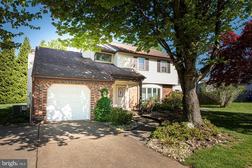 This adorable single - family home is move in ready and full of charm. Meticulously maintained and in excellent condition, it features a stylish kitchen complete with gleaming corian counters, under-cabinet lighting, dishwasher and newer stainless steel electric range. The inviting family room boasts a cozy brick surround fireplace. The breakfast area has sliding glass doors that open to a beautifully kept yard - perfect for relaxing or entertaining. Upstairs you'll enjoy three generously sized bedrooms, along with a spacious loft that overlooks the family room , creating an airy and open feel. The primary bedroom has private access to the hall bathroom includes hardwood floors and there is an extra sink and dressing area for your convenience. Located in a wonderful neighborhood close to schools and shopping, this home offers comfort, style and practicality-all at a very attractive price.