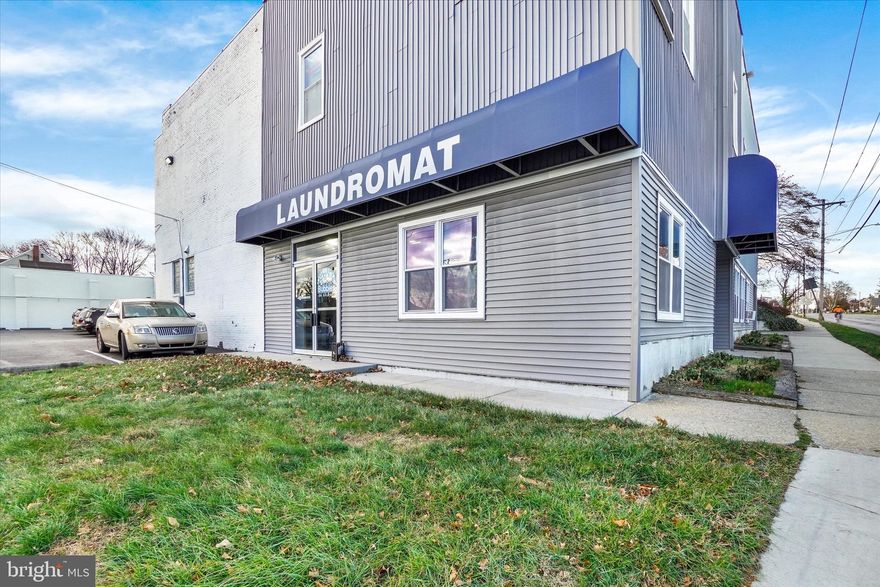 Prime location with exceptional visibility and unmatched traffic count, offering high desirability for a wide range of business opportunities. This versatile mixed-use property currently features multiple income producing operations, including a laundromat, a private exclusive gym, a private yoga studio, and a spacious 2,500 sq. ft. apartment. Additional value includes 12 dedicated parking spaces an outstanding advantage for both tenants and customers.