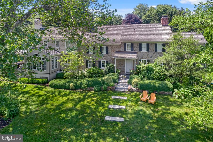 Don’t miss this stunning property in the sought-after Brooke Farm neighborhood in Wayne. This restored and expanded 4-5 BD stone colonial offers a rare combination of historic charm combined with today’s amenities, including an open concept Kitchen/Family Room and an attached, oversized, 3-car Garage. A unique feature is the fabulous Barn, which offers two levels of beautifully finished space with vaulted ceilings, exposed beams, a full bathroom, and wet bar/kitchenette. Currently used as a Media/Entertainment Room downstairs, and a Music Studio upstairs, this renovated historic structure has potential for use as an office, in-law / guest suite, art studio, or fitness studio… perfect for today’s pandemic-influenced lifestyles. Nestled on a spectacular, beautifully landscaped 1.25+ acre property, this home is adjacent to acres of natural open space which offers supreme privacy. The sparkling pool and spa has an outdoor shower and adjacent covered patio off the barn. Originally renovated and expanded by Chip Vaughan, this home has timeless design that incorporates vintage architectural details including exposed stone walls, original fireplaces, gleaming wood floors, and extensive custom millwork. The modern floor plan includes a 1st floor Office, spacious Living Room, Dining Room with stunning original stone fireplace, and a gourmet Kitchen with open views of the large Family Room and Breakfast Room. You’ll love relaxing and entertaining on multiple stone patios and gathering around the built-in firepit. Upstairs is a Master BD Suite with Master BA & walk-in closet, Laundry Room, (3) Hall BD, a large Bonus Room/5th BD and 2 more full BA. Downstairs is a finished Rec Room and a custom wine cellar. This home is centrally located in highly-ranked Radnor School District, just 5 minutes from train, shopping, and restaurants in the charming village of Wayne. Easy commuting distance to Center City, Airport, medical, and corporate centers. Showings by appt. only.
