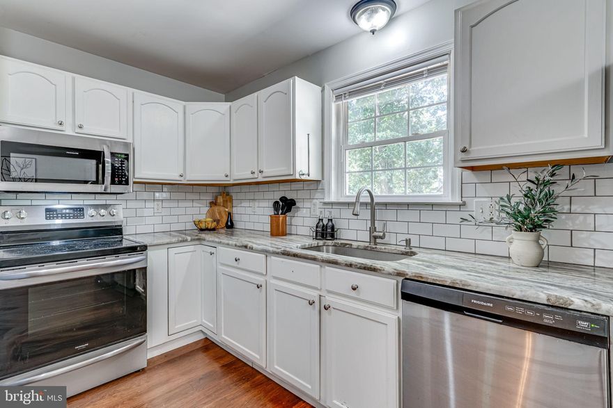 *** HOME BACK ON MARKET due to Buyer's failure to perform in accordance with the terms of the contract ***  Just listed and the most perfect fully fenced in back yard! Welcome to your dream home in Lusby, Maryland – a beautifully renovated 3-bedroom, 2-bath Rambler that exudes modern charm and comfort. As you step inside, you'll be greeted by an inviting open concept living space. The centerpiece of this home is the expansive, completely renovated eat-in kitchen, boasting stunning granite countertops that provide both elegance and functionality. The kitchen comes equipped with stainless steel appliances and luxury vinyl plank flooring. The primary bathroom has been meticulously renovated to create a spa-like retreat within your own home, with modern fixtures and a sleek design that ensures relaxation and convenience. Step outside to discover a fully fenced-in backyard, providing both security and privacy for outdoor activities. The deck offers a fantastic space for cookouts,  entertaining friends, or simply enjoying the serene surroundings. Additionally, a convenient shed in the backyard offers storage space for your outdoor equipment and tools.  Don't miss out on the opportunity to make this renovated gem!