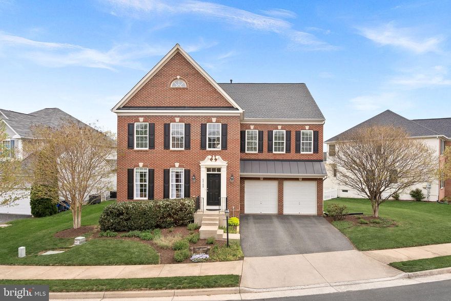 Welcome to this stunning single-family home located in the highly sought-after Little River Commons community. Perfectly situated near shopping, dining, and just a short walk to the Paul VI High School campus, this home combines convenience with elegance. The main level features beautiful refinished hardwood floors (2022), a dedicated office, and a dramatic two-story family room complete with a striking stone fireplace and a wall of windows that flood the space with natural light. The updated kitchen, renovated in 2022, showcases light cabinetry, quartz countertops, stainless steel appliances, and upgraded lighting—ideal for both everyday living and entertaining.

Enjoy added functionality with a main level laundry room and a separate mudroom with built-ins just off the garage. Upstairs, you’ll find four spacious bedrooms and three full bathrooms, including a luxurious primary suite with a large walk-in closet and an expansive en-suite bath featuring dual sinks, a soaking tub, and a massive walk-in shower. The additional bedrooms include a Jack-and-Jill bathroom and a private en-suite.

The walk-up basement offers even more living space with a large rec room, a den, a full bath, and additional garage access. Step outside to the composite deck and enjoy peaceful evenings in your backyard oasis. Recent upgrades include a new washer and dryer (2024), new toilets, water heater (2024), dual HVAC systems (2023), and a roof replacement (2017). Additional features include an in-ground sprinkler system for easy lawn maintenance. 

This home truly has it all—style, space, and updates throughout!