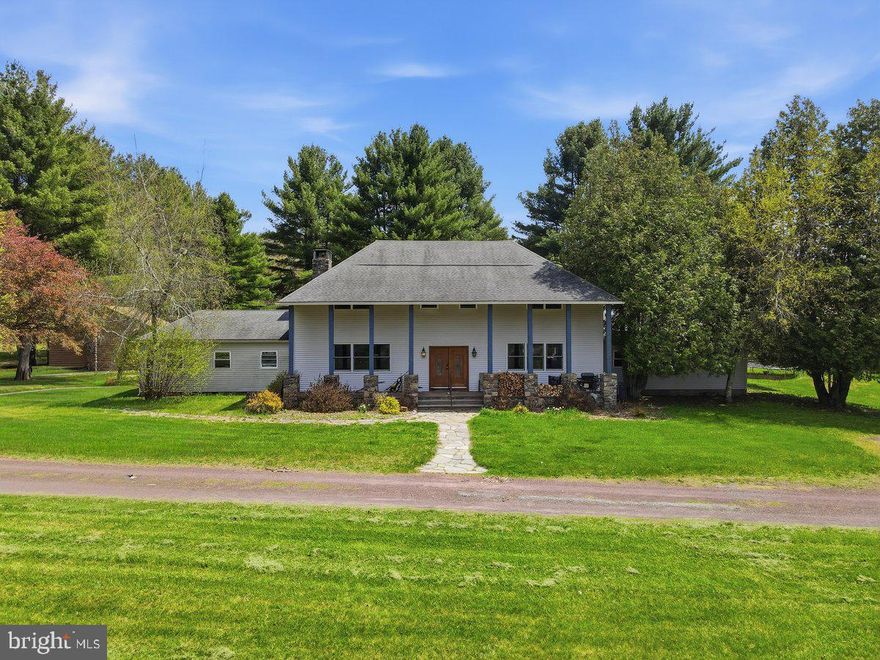 Exceptional opportunity on 27.86 acres of level, cleared land with substantial infrastructure and improvements, offering outstanding potential for commercial, residential, hospitality, or mixed-use development. This one-of-a-kind property features approximately 27,500± SF across multiple structures, including two homes, six cottages, two reception halls, a chapel, barns, and additional outbuildings. Many of the original buildings were constructed using timber harvested directly from the land, showcasing rare craftsmanship, character, and historic appeal. Beautiful stone fireplaces are featured throughout many of the buildings, adding warmth and timeless architectural charm. The property offers robust utilities including 600-amp electrical service and an outdoor wood-burning furnace serving as one of the heat sources. Additional highlights include an ultra-modern 24-dog kennel featuring radiant heat, central air conditioning, an exam room, and washroom, as well as an on-site pond and ample space suitable for farm animals or agricultural use. The property currently includes a 5,600± SF residential home, adding immediate usability and flexibility. A truly unique property with scale, flexibility, and infrastructure rarely found in the Pocono Mountains.