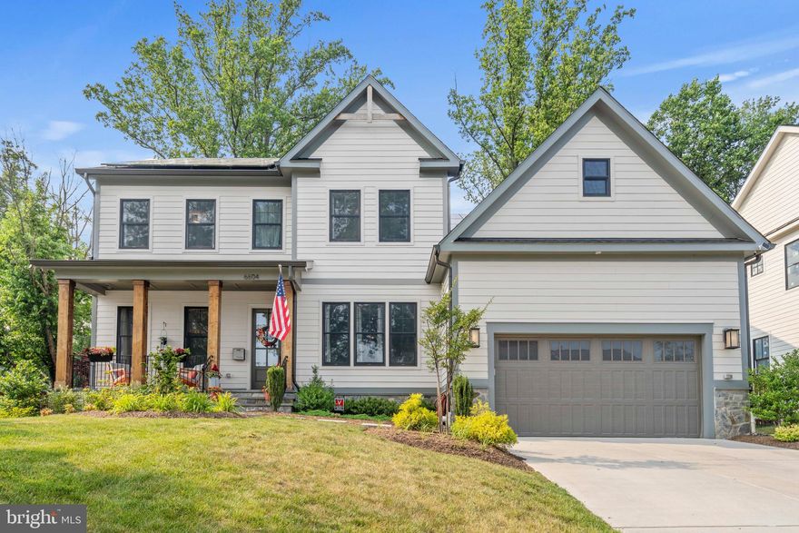 Better than new - this 6BD/ 5.5 BA home built by Focal Point Homes was built in 2020 and has approx. 6000 sq ft of interior space on a ¼ acre lot.  With over $250,000 in upgrades inside and out, it could be the perfect opportunity for you to have a like-new home this summer! From the moment you walk in the door you will love the feeling of the 10’ ceilings on the main level and the welcoming foyer with hardwood floors in a herringbone pattern. Stunning living and dining rooms flank either side of the entry with custom wood trim accent walls, gorgeous windows and designer chandeliers. Admire the artistry of the entry’s wallpaper as you are drawn into the spacious family room with a coffered ceiling, inset gas fireplace, built-in shelves and luminous windows. The family room flows into the impressive kitchen with double islands, gourmet Kitchen Aid commercial grade appliances, quartzite and quartz countertops, extensive storage in the cabinets and spacious pantry. Bring in groceries through the garage and mudroom after a busy day to cook in the kitchen, then relax on the back patio and yard or use the home office just off the family room for homework or projects. The office/library has pocket doors and an en suite full bathroom so it easily converts to a main level bedroom.  Continue to be impressed as you climb the elegant staircase and see the opportunity to display your own art or photos within the custom woodwork on the walls. The upstairs boasts  9’ ceilings, and hardwood floors, and a primary suite with a jumbo walk-in closet. The spa-like primary bath has heated floors, glass shower, elegant soaker tub, private w/c, linen closet and separate vanities. Doing laundry is fun and convenient in this cheery and spacious laundry located near the 3 other bedrooms and 2 full baths. The walkout lower level will make your jaw drop when you see the immense recreation room with movie projector, giant screen, plus state of the art gym with glass panel doors, rubber floor, ceiling fan and water bottle filler. The 6th bedroom and 5th full bath are also on the lower level, plus lots of storage space and a workshop that is plumbed to be a future sauna.  Not to be overlooked are all the energy saving details and whole house upgrades starting with the solar panels which charge two whole house batteries, Anderson 400 series windows, solid core doors, extra electrical features, custom lighting and high end finishes, upgraded cabinets and countertops in kitchen and bathrooms. Ask about all the warranties that convey with this 3 year old home.  This home resides in the Haycock Elementary, Longfellow Middle and McLean High school pyramid. AND.....This property has an INCREDIBLE Assumable VA Loan that for the right offer, gives the buyers an opportunity to assume and lock in a 2.25% interest rate for the next 27 years. Unbelievable opportunity to get this almost new home at rates that are long forgotten!