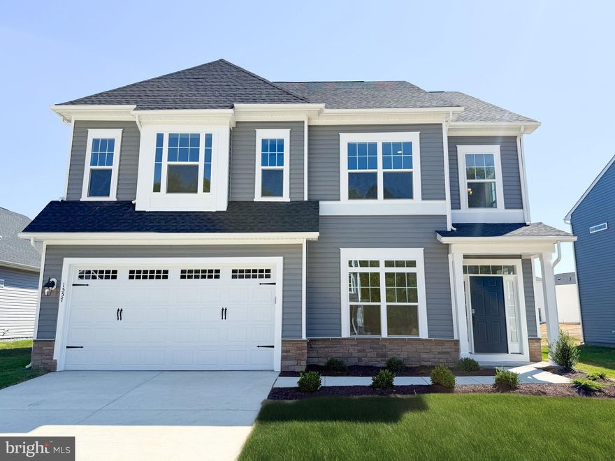 Brand New Home is Ready for Move In!! Step into the stunning two-story Beckham home and experience the perfect blend of luxury and comfort. From the moment you enter the grand foyer, you’ll be greeted by an impressive and inviting open-concept floor plan. The home features upgraded interior railing, hardware, and lighting throughout, all complemented by a premium exterior color package. The main level offers both style and functionality. Tucked away for privacy, the library is the perfect spot for a home office. The spacious gourmet kitchen is a chef’s dream, featuring a large center island, a walk-in pantry, and gourmet stainless steel appliances, including double ovens. The kitchen shines with Carrara Morro quartz countertops and white cabinets with matte black hardware. The sink overlooks the rear patio, providing a lovely view. The kitchen flows seamlessly into the bright family room, which is enhanced by additional windows and a contemporary fireplace. This entire space extends across the back of the home, creating a perfect area for entertaining.
Upstairs, the home continues to impress. The primary suite is a true retreat, beginning with double doors that open to a private foyer. The bedroom itself is a serene escape, and the en suite bath features a glass shower, upgraded lighting, and quartz countertops. The primary suite is completed by two massive walk-in closets, offering abundant storage. A versatile loft area provides the ideal space for a second family room or media room. Three additional bedrooms share a full bathroom, and a conveniently located laundry room with sink complete the second floor.
Located in Trappe, MD just minutes from Easton, MD, Lakeside at Trappe is an amenity-rich community that allows for daily recreation and easy access to all your needs in Easton, Cambridge, and beyond.
Community currently offers a pool, bathhouse with fitness room, ping pong, corn hole and Bark park. Playground and racquet sports courts planned to open soon with an immersive lakeside experience also in the works!
Ask about special financing available and closing costs!